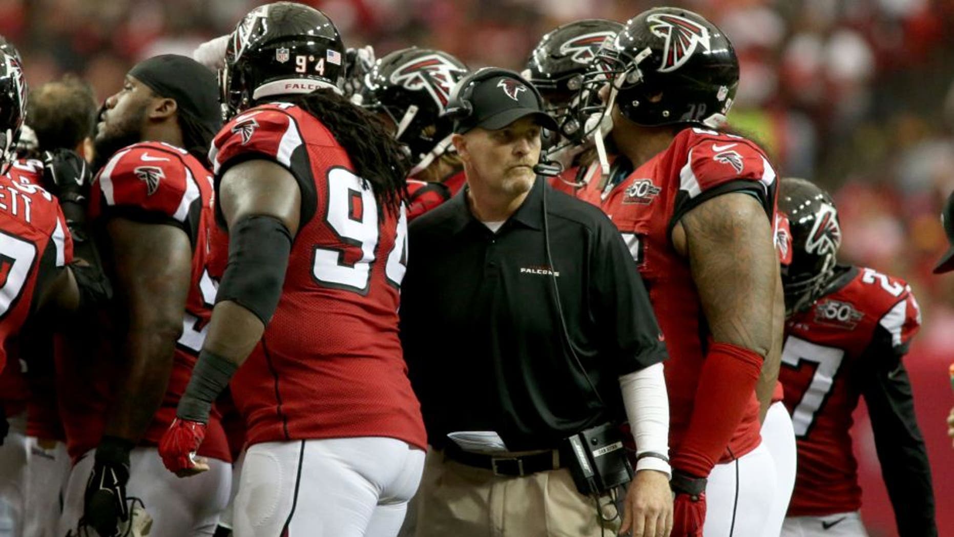 Oct 11, 2015; Atlanta, GA, USA; Atlanta Falcons head coach Dan Quinn leaves a defensive huddle in the second quarter of their game against the Washington Redskins at the Georgia Dome. Mandatory Credit: Jason Getz-USA TODAY Sports