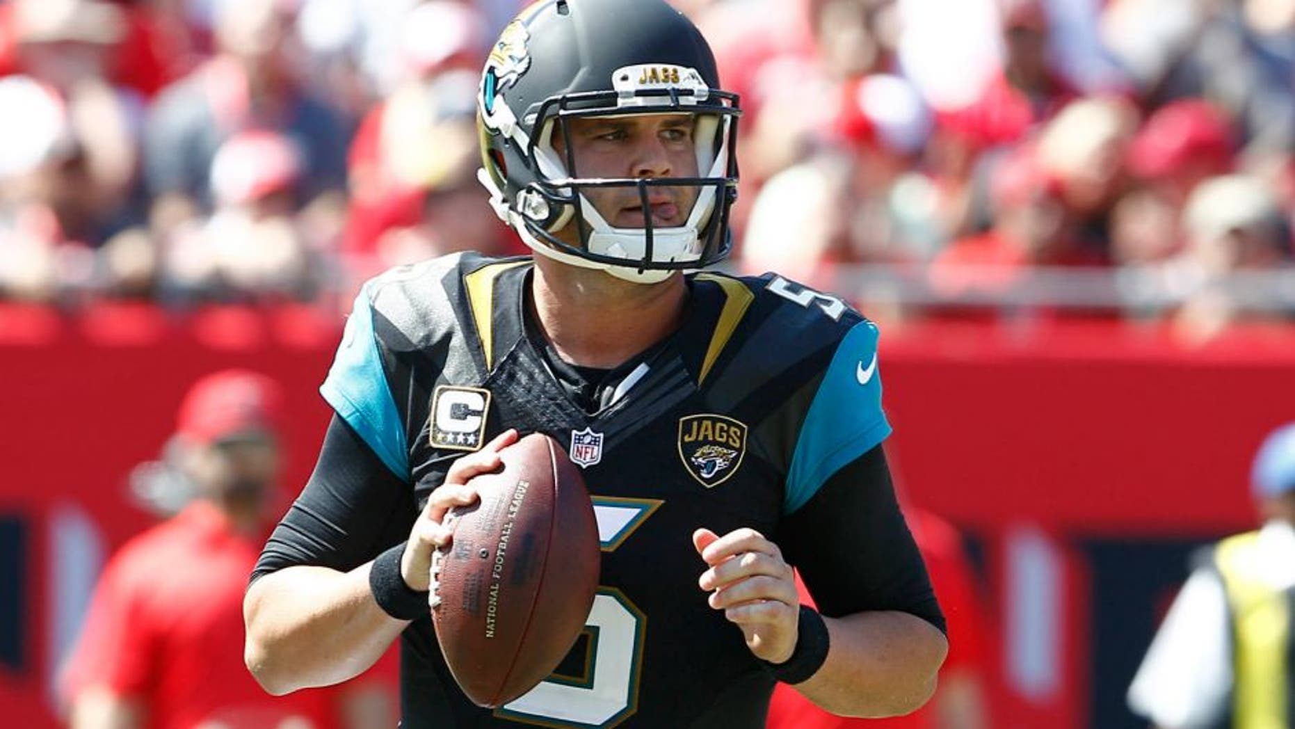 Oct 11, 2015; Tampa, FL, USA; Jacksonville Jaguars quarterback Blake Bortles (5) drops to throw a pass during the second quarter of an NFL football game against the Tampa Bay Buccaneers at Raymond James Stadium. Mandatory Credit: Reinhold Matay-USA TODAY Sports