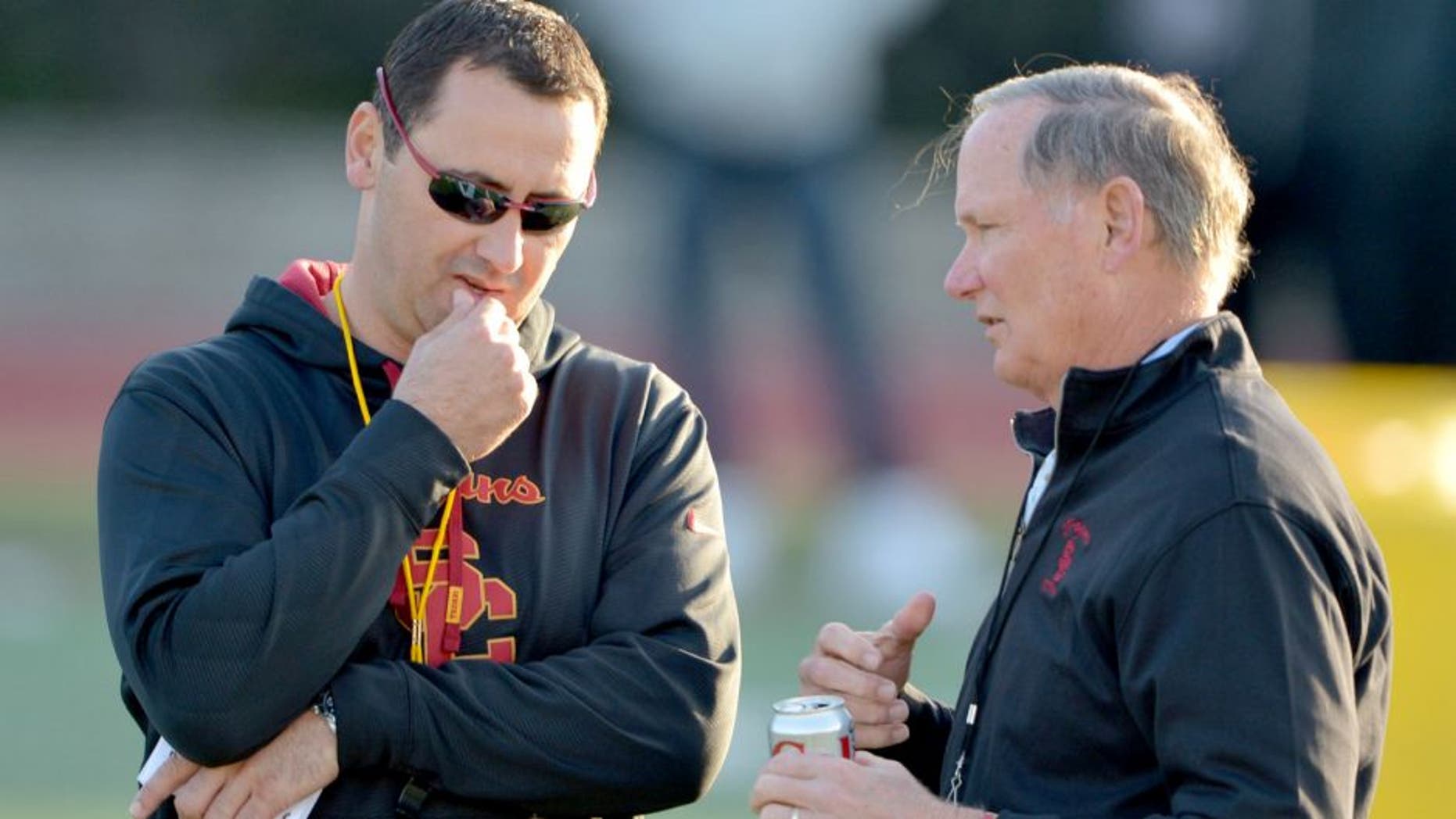 Mar 3, 2015; Los Angeles, CA, USA; Southern California Trojans coach Steve Sarkisian (left) and athletic director Pat Haden at spring practice at Cromwell Field. Mandatory Credit: Kirby Lee-USA TODAY Sports