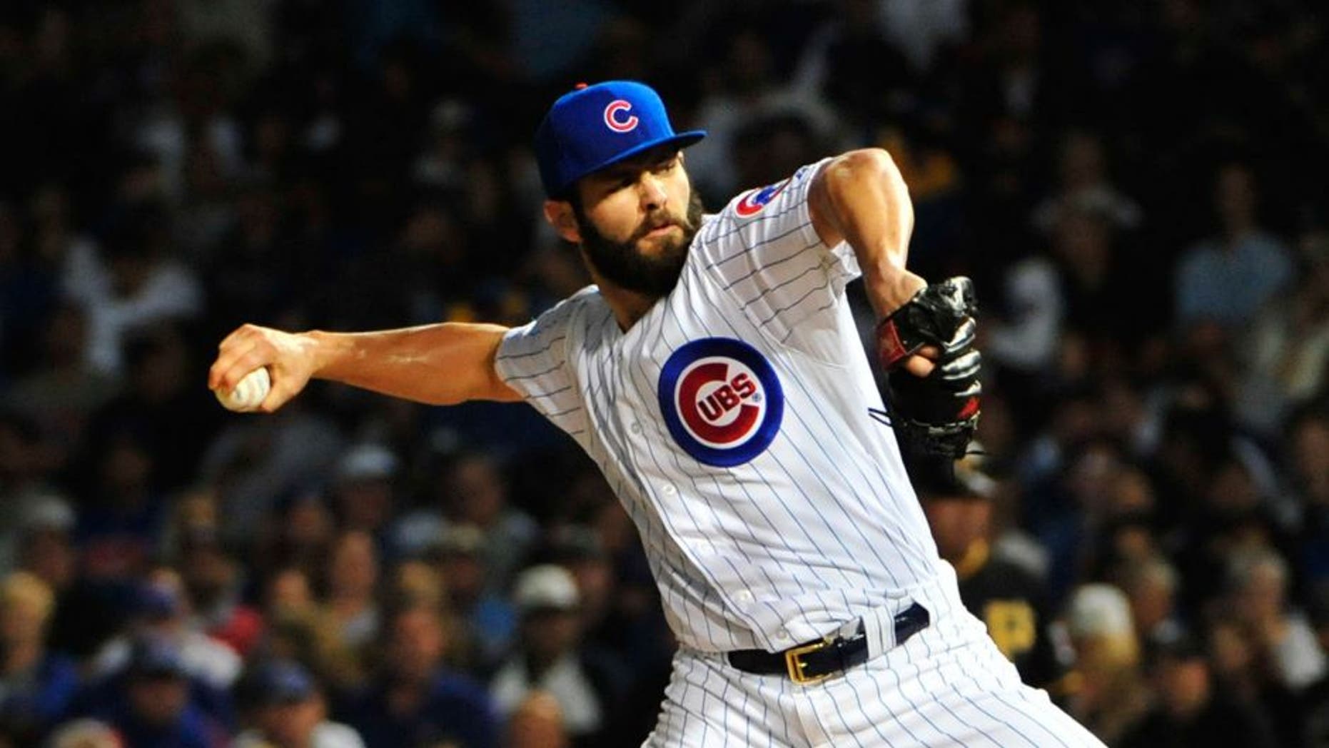 CHICAGO, IL - SEPTEMBER 27: Jake Arrieta #49 of the Chicago Cubs pitches against the Pittsburgh Pirates during the first inning on September 27, 2015 at Wrigley Field in Chicago, Illinois. (Photo by David Banks/Getty Images)