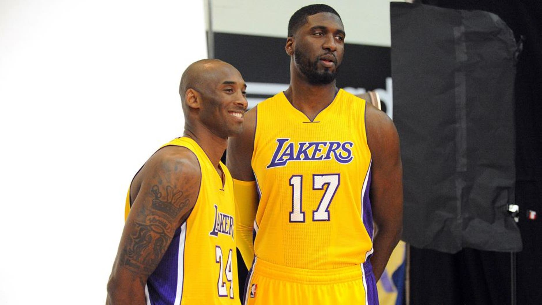 September 28, 2015; El Segundo, CA, USA; Los Angeles Lakers guard Kobe Bryant (left) and center Roy Hibbert pose for photographs during media day at Toyota Sports Center. Mandatory Credit: Gary A. Vasquez-USA TODAY Sports