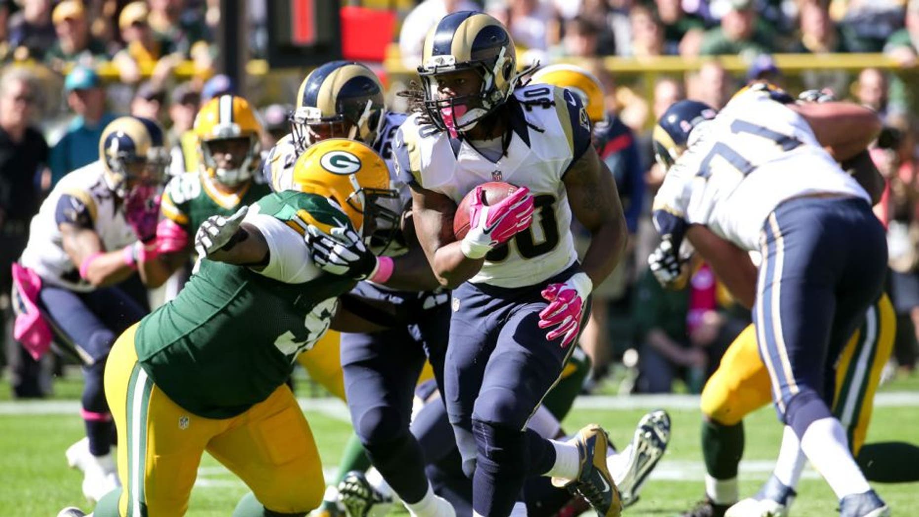 GREEN BAY, WI - OCTOBER 11: Todd Gurley #30 of the St. Louis Rams carries the football against the Green Bay Packers in the second quarter at Lambeau Field on October 11, 2015 in Green Bay, Wisconsin. (Photo by Jonathan Daniel/Getty Images)
