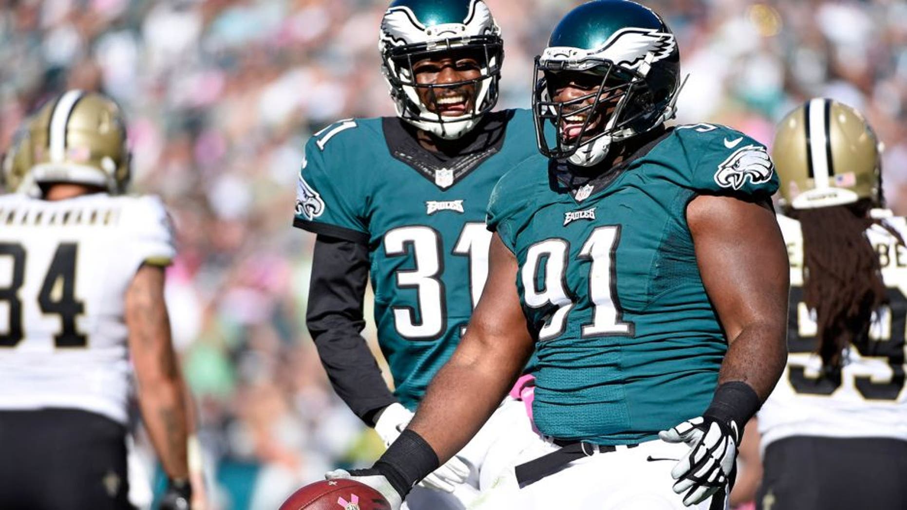 Oct 11, 2015; Philadelphia, PA, USA; Philadelphia Eagles defensive end Fletcher Cox (91) celebrates after recovering a fumble against the New Orleans Saints at Lincoln Financial Field. Mandatory Credit: Eric Hartline-USA TODAY Sports