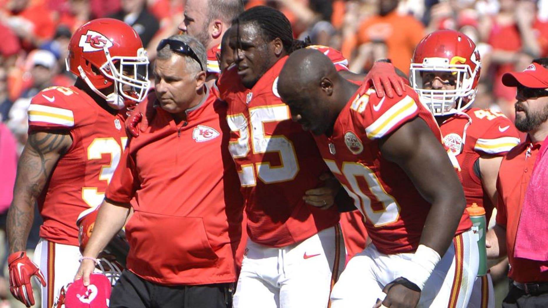 Oct 11, 2015; Kansas City, MO, USA; Kansas City Chiefs running back Jamaal Charles (25) is helped off the field against the Chicago Bears in the second half at Arrowhead Stadium. Chicago won the game 18-17. Mandatory Credit: John Rieger-USA TODAY Sports