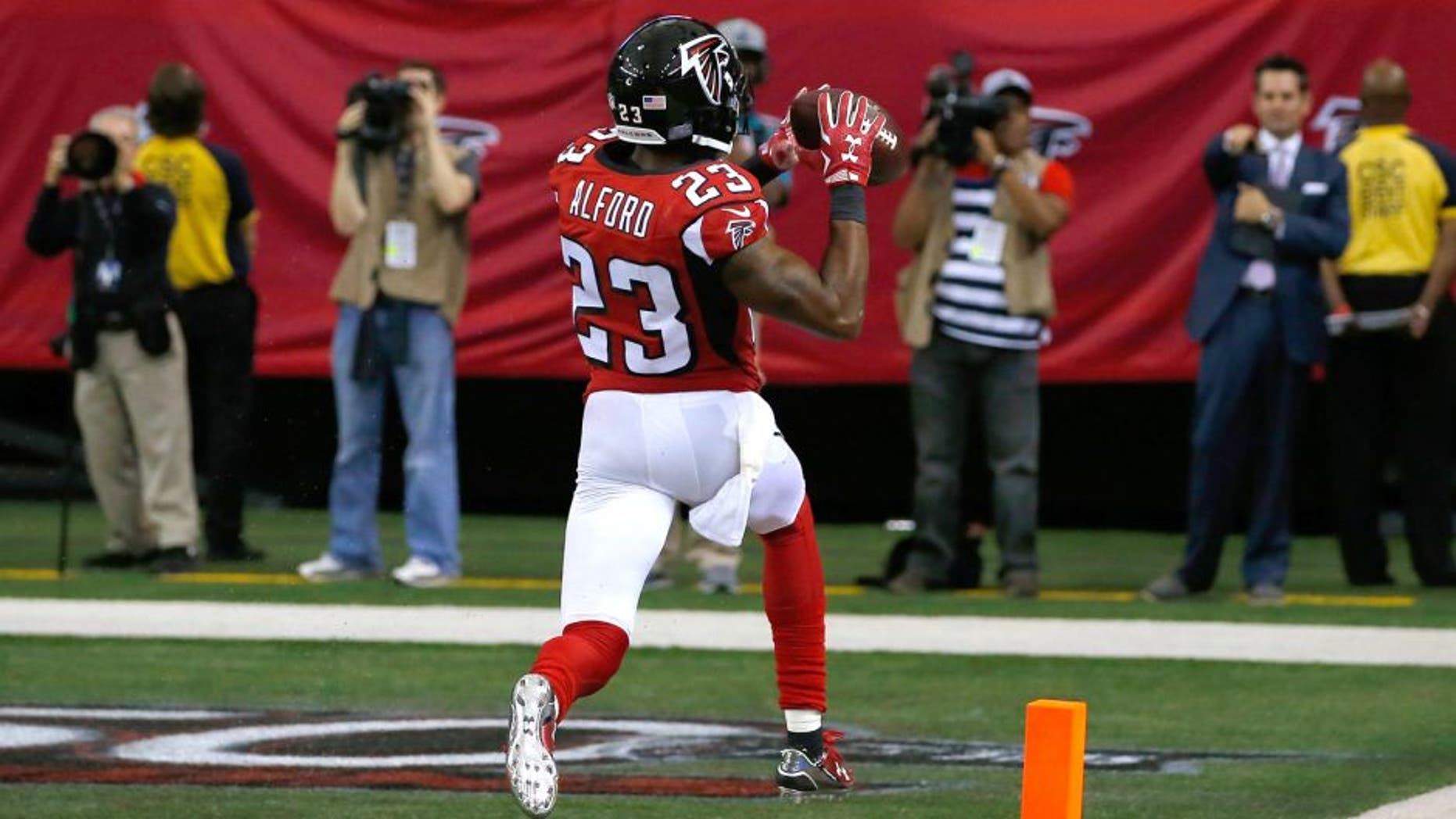 ATLANTA, GA - OCTOBER 11: Robert Alford #23 of the Atlanta Falcons returns an interception for a touchdown in their 25-19 overtime win against the Washington Redskins at Georgia Dome on October 11, 2015 in Atlanta, Georgia. (Photo by Kevin C. Cox/Getty Images)