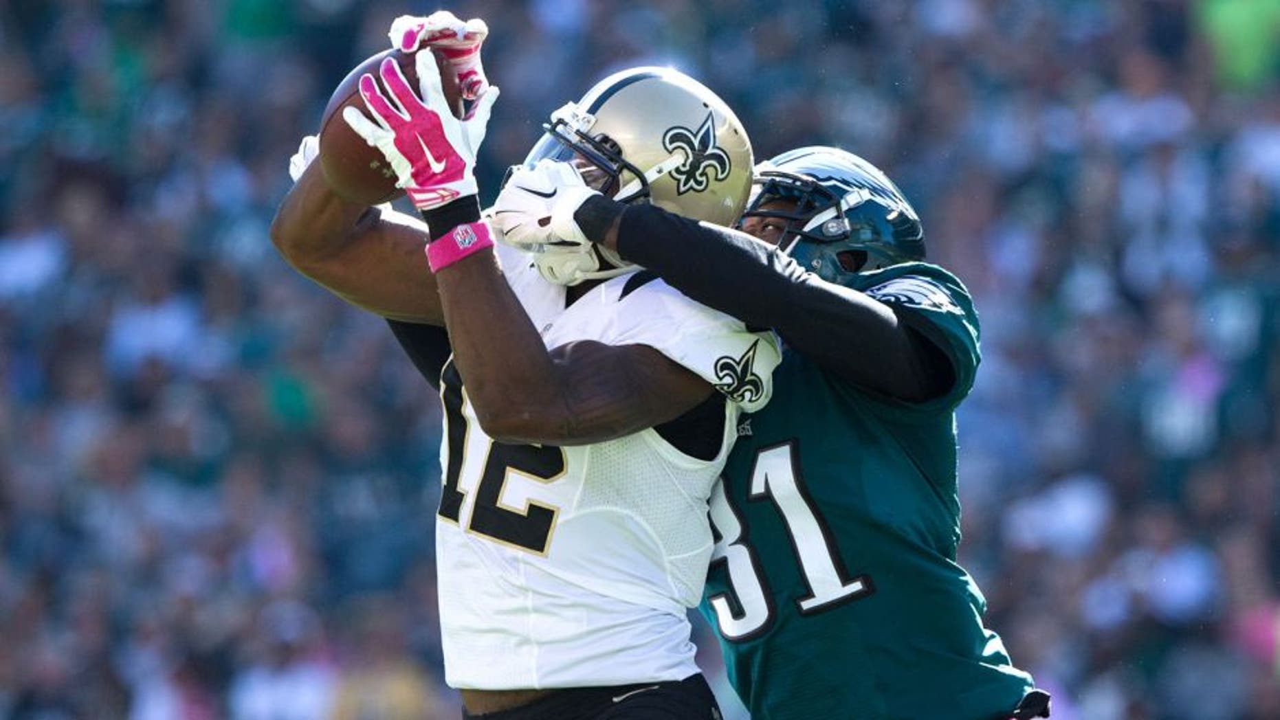 Oct 11, 2015; Philadelphia, PA, USA; New Orleans Saints wide receiver Marques Colston (12) makes a catch against the defense of Philadelphia Eagles cornerback Byron Maxwell (31) during the third quarter at Lincoln Financial Field. Mandatory Credit: Bill Streicher-USA TODAY Sports
