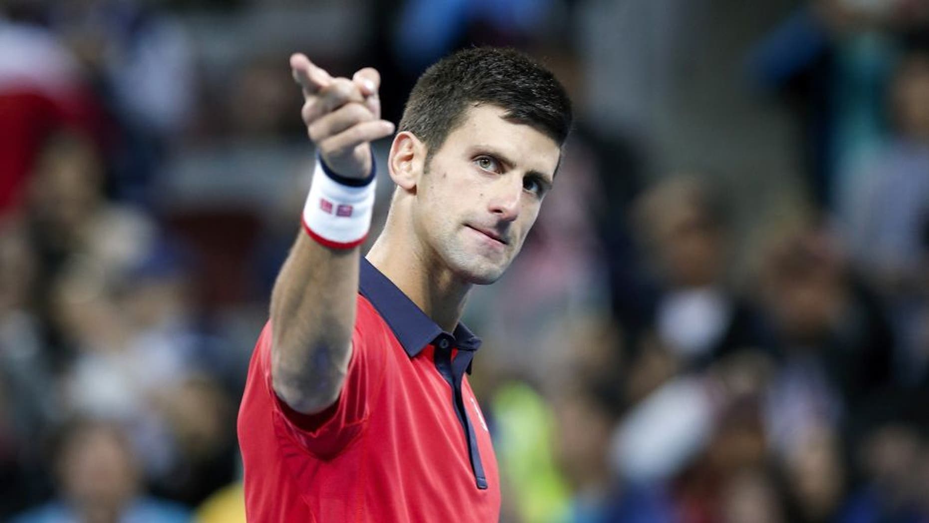 BEIJING, CHINA - OCTOBER 11: Novak Djokovic of Serbia celebrates after winning the Men's Single Final match against Rafael Nadal of Spain on day 9 of the 2015 China Open at the China National Tennis Centre on October 11, 2015 in Beijing, China. (Photo by Lintao Zhang/Getty Images)