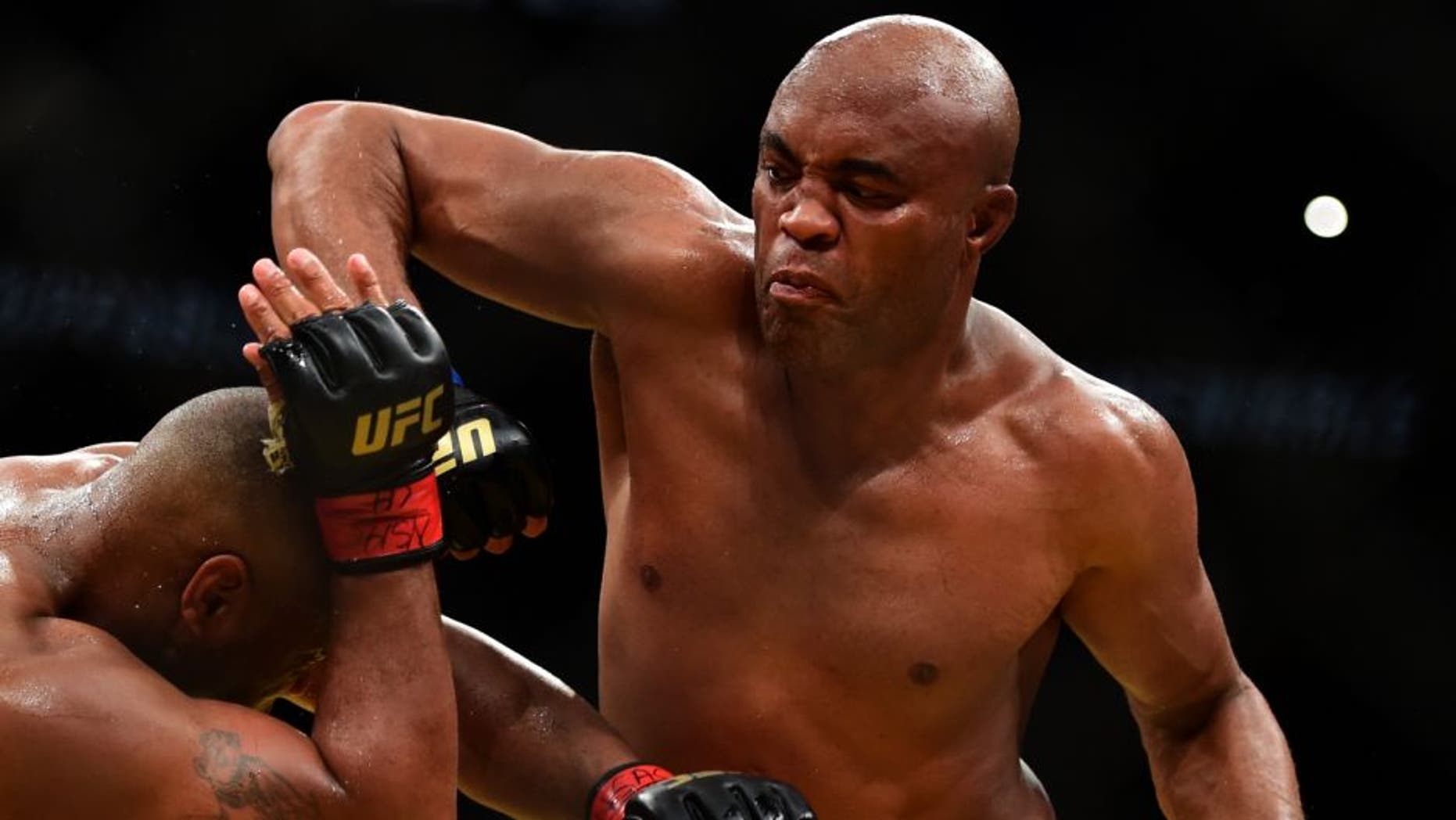 LAS VEGAS, NV - JULY 09: (R-L) Anderson Silva of Brazil elbows Daniel Cormier in their light heavyweight bout during the UFC 200 event on July 9, 2016 at T-Mobile Arena in Las Vegas, Nevada. (Photo by Harry How/Zuffa LLC/Zuffa LLC via Getty Images)