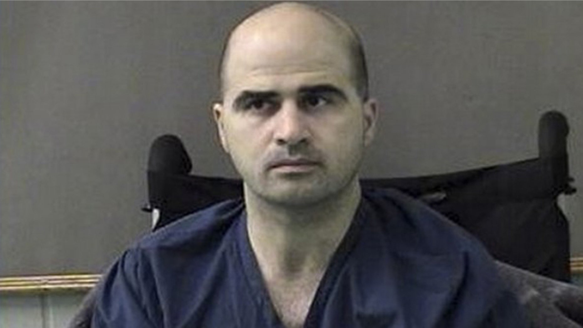 This April 9, 2010, file photo released by the Bell County Sheriffs Department shows Maj. Nidal Hasan at the Bell County Jail in Belton, Texas.