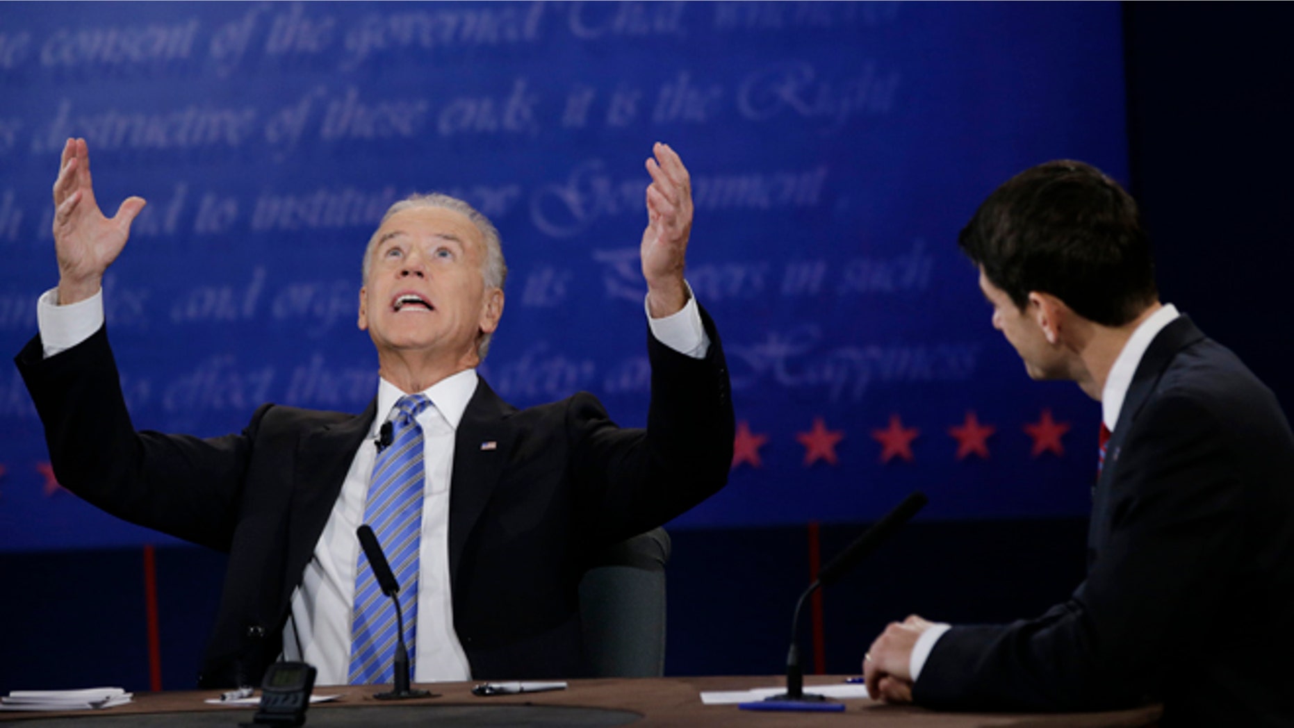 Oct. 11, 2012: Republican vice presidential nominee Rep. Paul Ryan, of Wisconsin, right, watches as Vice President Joe Biden, speaks during the vice presidential debate at Centre College in Danville, Ky.