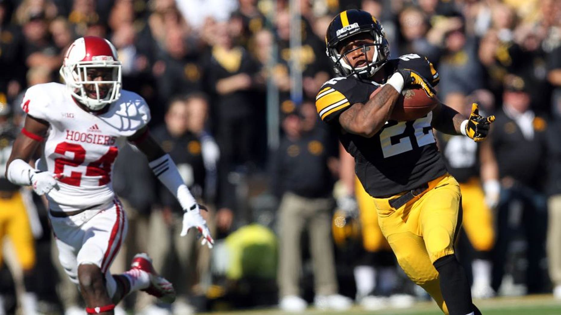 Oct 11, 2014; Iowa City, IA, USA; Iowa Hawkeyes wide receiver Damond Powell (22) catches a pass for a touch down against the Indiana Hoosiers at Kinnick Stadium. Mandatory Credit: Reese Strickland-USA TODAY Sports