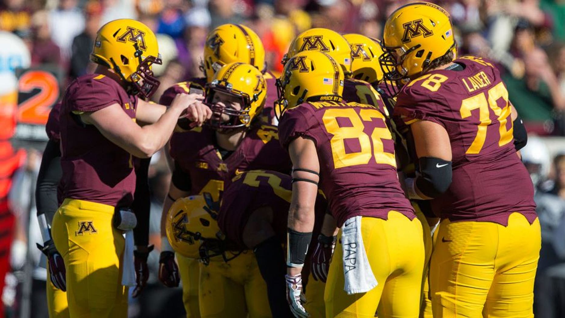 Oct 11, 2014; Minneapolis, MN, USA; Minnesota Golden Gophers quarterback Mitch Leidner (7) calls out a play to the rest of the Minnesota Golden Gophers offense in first half against the Northwestern Wildcats at TCF Bank Stadium. Mandatory Credit: Jesse Johnson-USA TODAY Sports