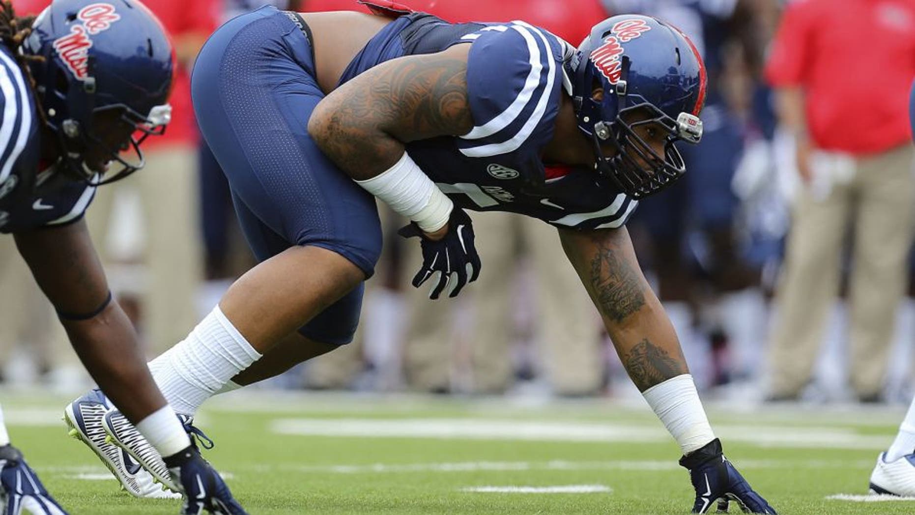 Sep 13, 2014; Oxford, MS, USA; Mississippi Rebels defensive tackle Robert Nkemdiche (5) steps up to the line during the game against the Louisiana-Lafayette Ragin Cajuns at Vaught-Hemingway Stadium. Mandatory Credit: Spruce Derden-USA TODAY Sports