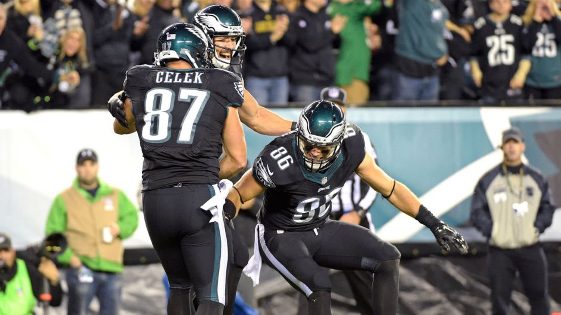 Oct 12, 2014; Philadelphia, PA, USA; Philadelphia Eagles tight end James Casey (85) celebrates his 26-yard touchdown catch with tight end Zach Ertz (86) and tight end Brent Celek (87) against the New York Giants during the second quarter at Lincoln Financial Field. Mandatory Credit: Eric Hartline-USA TODAY Sports