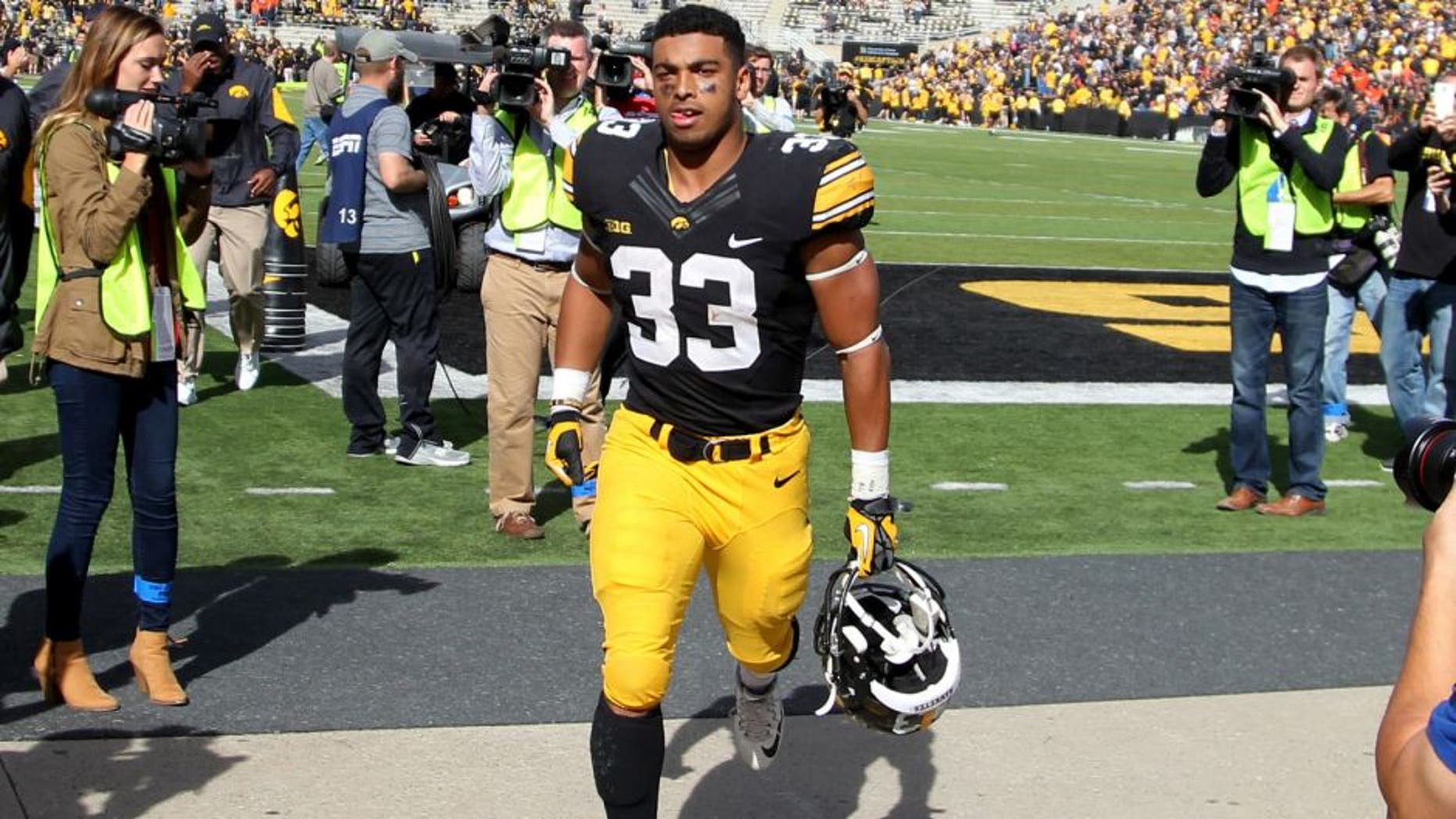 Oct 10, 2015; Iowa City, IA, USA; Iowa Hawkeyes running back Jordan Canzeri (33) leaves Kinnick Stadium after beating the Illinois Fighting Illini. Iowa beat Illinois 29-20. Mandatory Credit: Reese Strickland-USA TODAY Sports