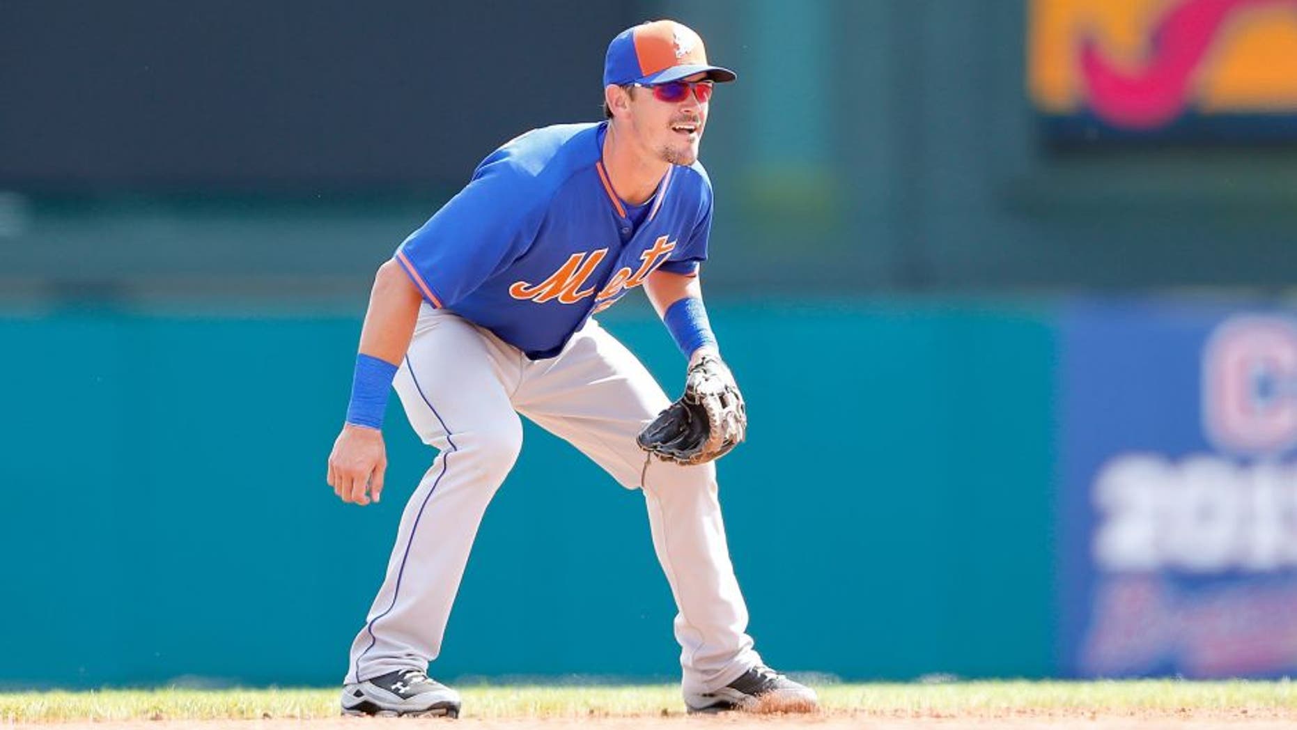 LAKE BUENA VISTA, FL - MARCH 10: Matt Reynolds #55 of the New York Mets gets ready to field the ball during the Spring Training game against the Atlanta Braves at Champion Stadium on March 10, 2015 in Lake Buena Vista, Florida. The Braves defeated the Mets 3-2. (Photo by Leon Halip/Getty Images)