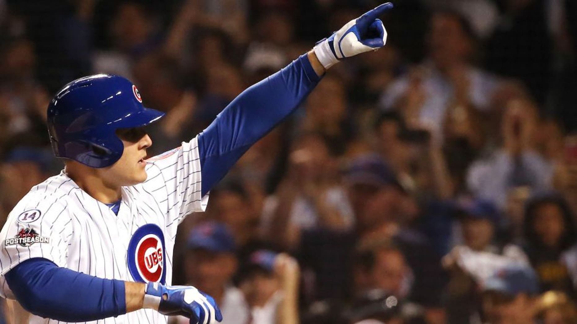 CHICAGO, IL - OCTOBER 12: Anthony Rizzo #44 of the Chicago Cubs reacts after hitting a solo home run in the fifth inning against the St. Louis Cardinals during game three of the National League Division Series at Wrigley Field on October 12, 2015 in Chicago, Illinois. (Photo by Jonathan Daniel/Getty Images)