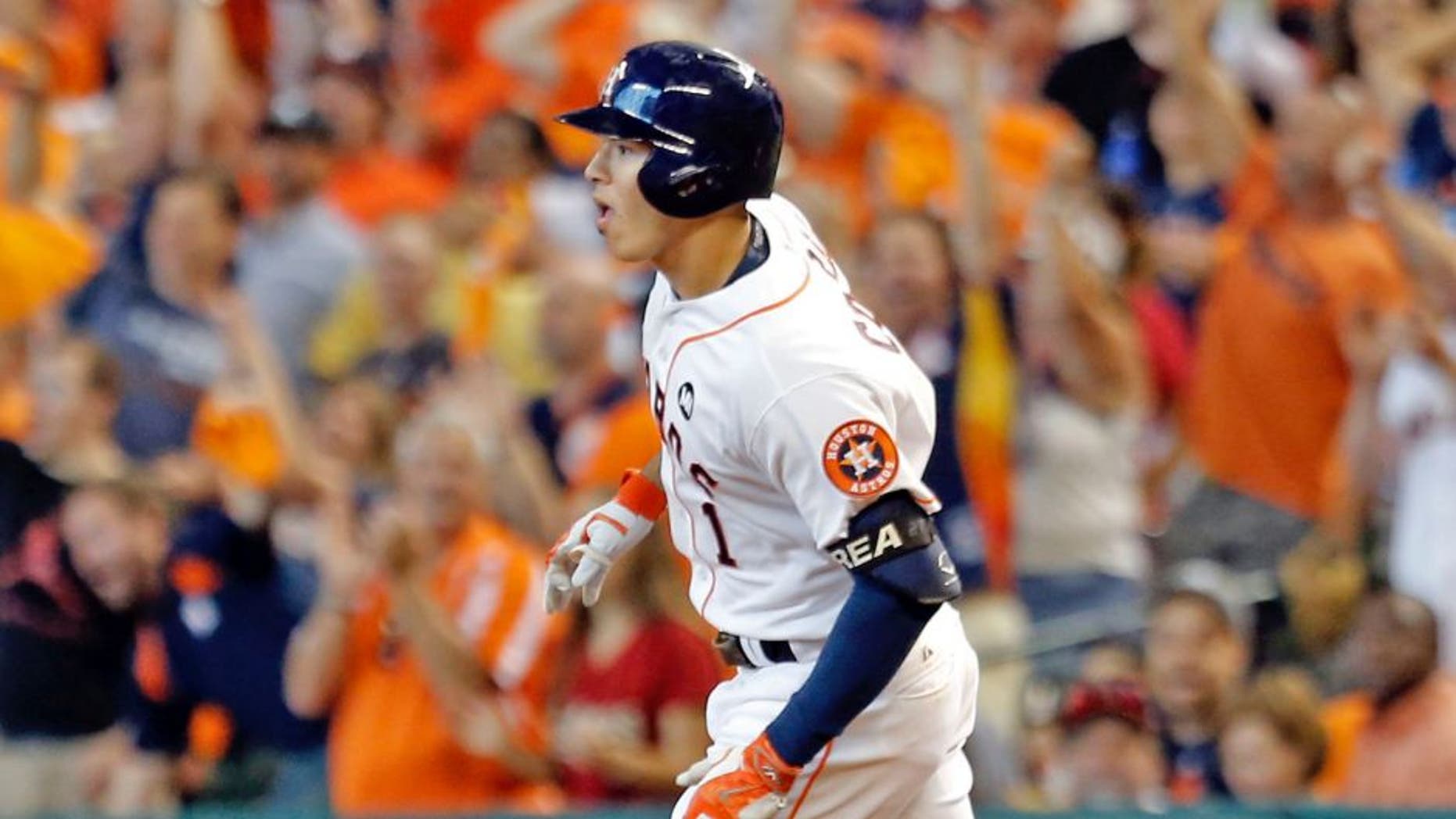 Oct 12, 2015; Houston, TX, USA; Houston Astros shortstop Carlos Correa (1) rounds the bases after hitting a solo home run against the Kansas City Royals during the third inning in game four of the ALDS at Minute Maid Park. Mandatory Credit: Thomas B. Shea-USA TODAY Sports