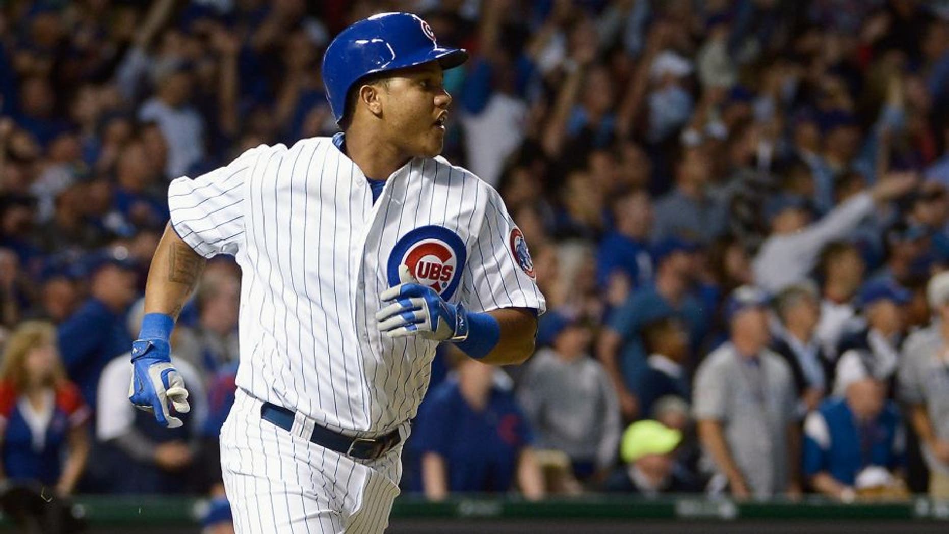 CHICAGO, IL - OCTOBER 12: Starlin Castro #13 of the Chicago Cubs runs the bases after hitting a solo home run in the fourth inning against the St. Louis Cardinals during game three of the National League Division Series at Wrigley Field on October 12, 2015 in Chicago, Illinois. (Photo by David Banks/Getty Images)