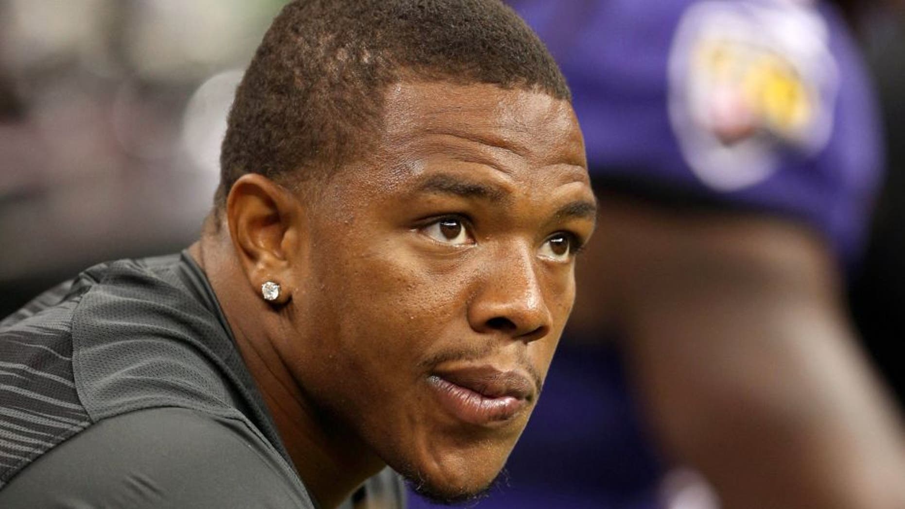 Aug 28, 2014; New Orleans, LA, USA; Baltimore Ravens running back Ray Rice (27) watches their game against the New Orleans Saints from the bench in the second quarter at the Mercedes-Benz Superdome. Mandatory Credit: Chuck Cook-USA TODAY Sports