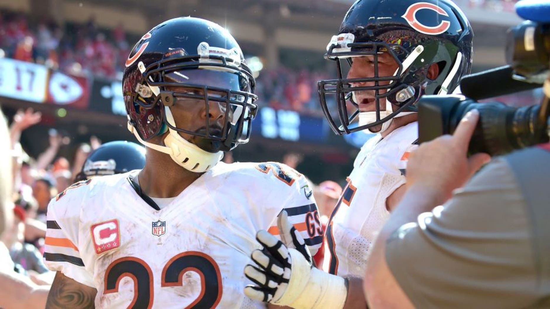 Oct 11, 2015; Kansas City, MO, USA; Chicago Bears running back Matt Forte (22) is congratulated by tackle Charles Leno (72) after scoring the winning touchdown during the second half against the Kansas City Chiefs at Arrowhead Stadium. The Bears won 18-17. Mandatory Credit: Denny Medley-USA TODAY Sports