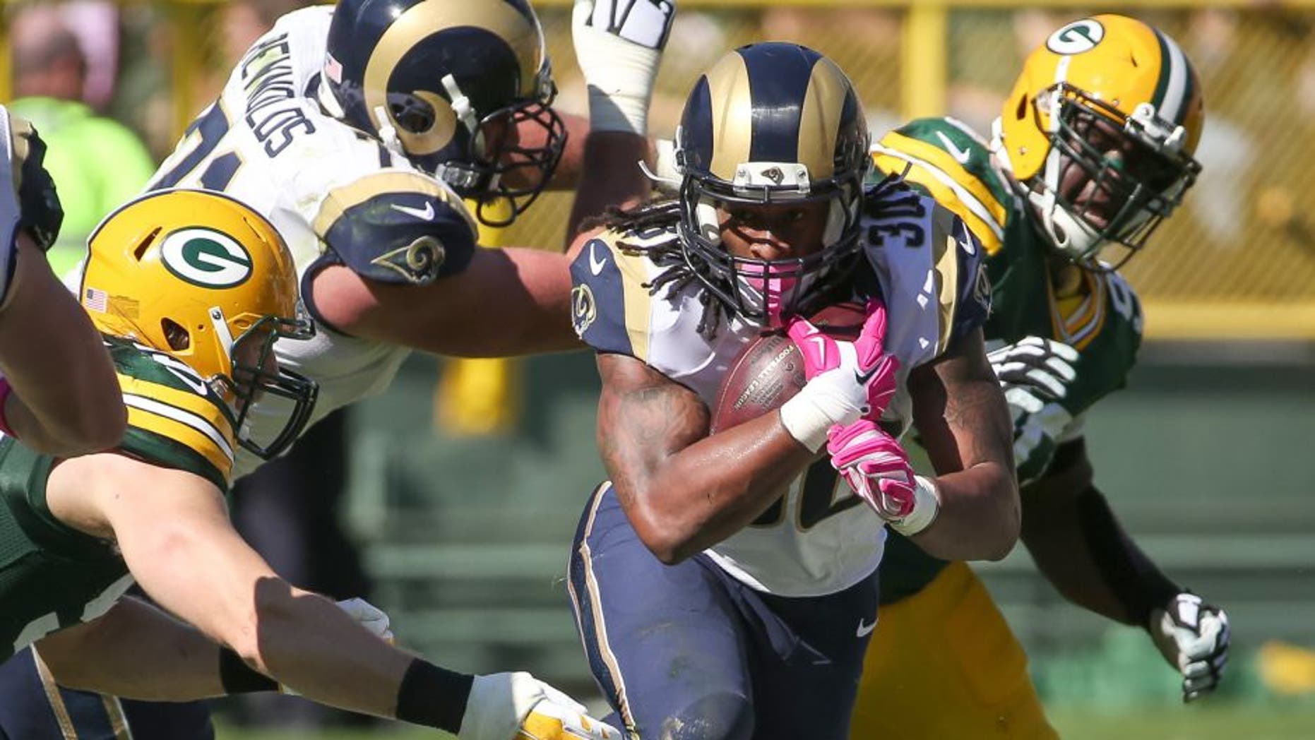 GREEN BAY, WI - OCTOBER 11: Todd Gurley #30 of the St. Louis Rams carries the football against the Green Bay Packers in the second quarter at Lambeau Field on October 11, 2015 in Green Bay, Wisconsin. (Photo by Jonathan Daniel/Getty Images)
