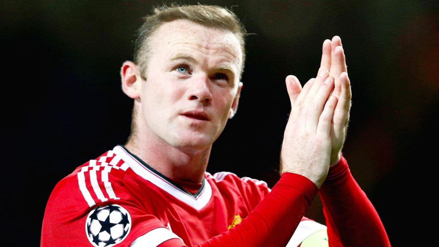 MANCHESTER, ENGLAND - SEPTEMBER 30: Wayne Rooney of Manchester United applauds the crowd after victory in the UEFA Champions League Group B match between Manchester United FC and VfL Wolfsburg at Old Trafford on September 30, 2015 in Manchester, United Kingdom. (Photo by Dean Mouhtaropoulos/Getty Images)