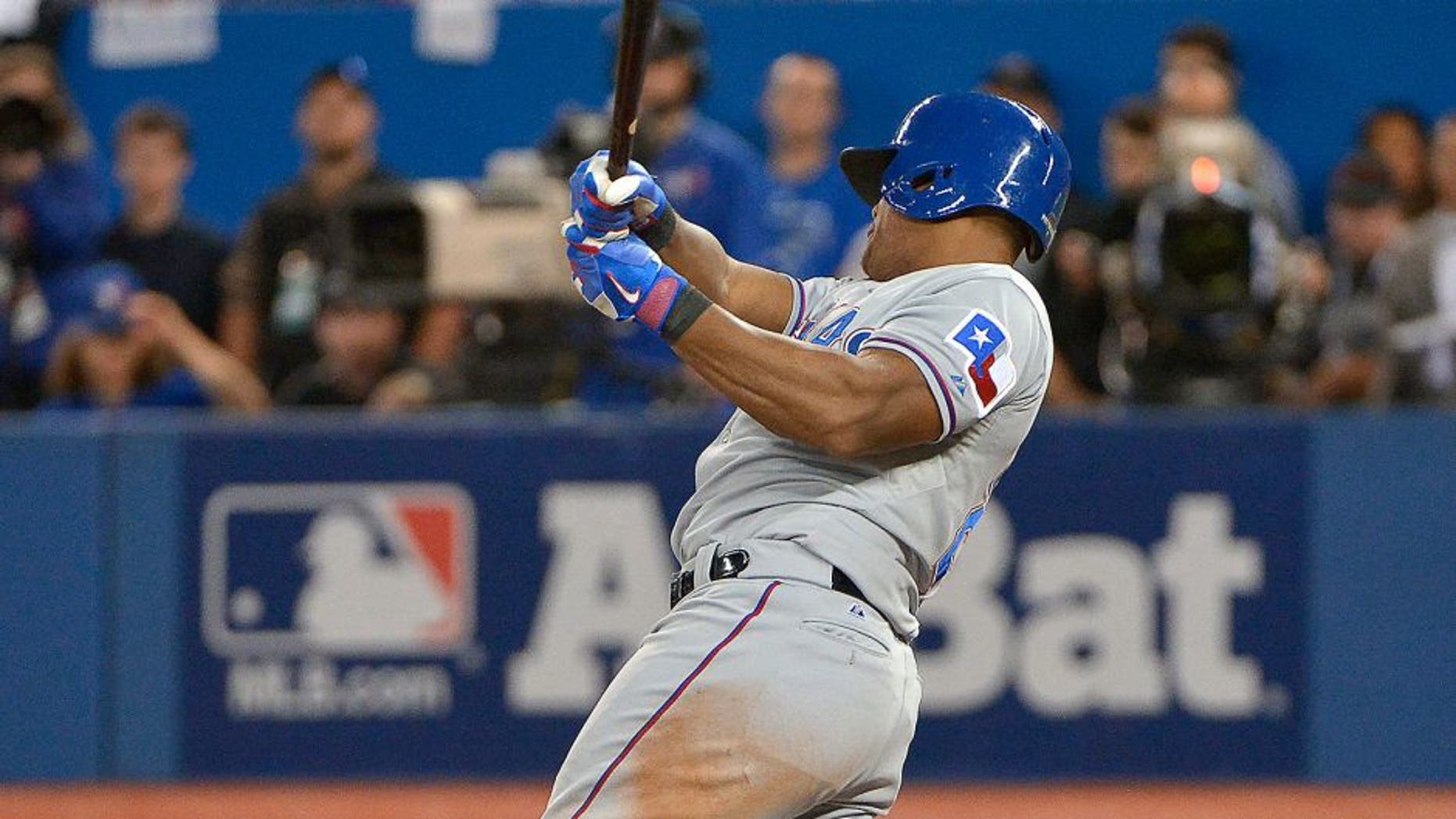 The Texas Rangers' Adrian Beltre (29) hits an RBI single during the third inning against the Toronto Blue Jays during Game 1 of the ALDS at Rogers Centre in Toronto on Thursday, Oct. 8, 2015. The Rangers won, 5-3. (Max Faulkner/Fort Worth Star-Telegram/TNS via Getty Images)