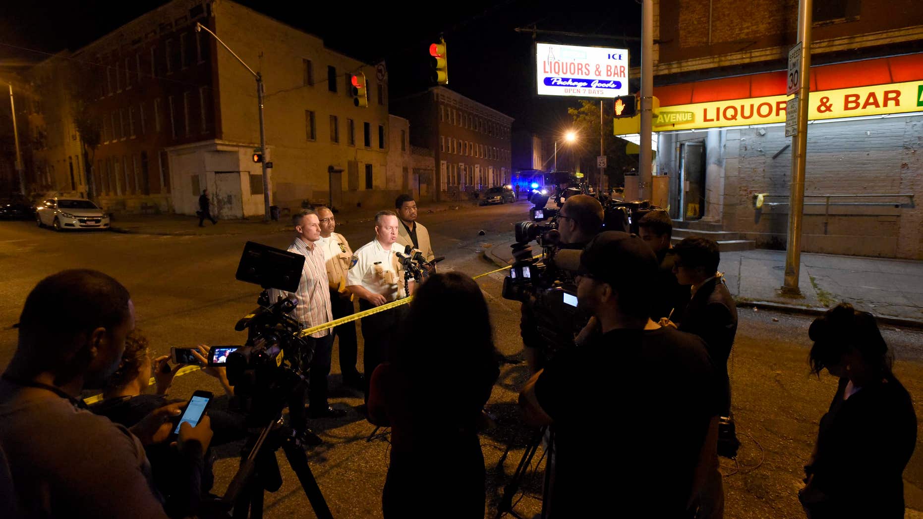 Sept. 24, 2016: Baltimore police, from left, Deputy Commissioner Dean Palmere, Stanley Brandford, chief of detectives, Commissioner Kevin Davis and T.J. Smith, police spokesman, speak to reporters at a scene where multiple people were shot and wounded in Baltimore.