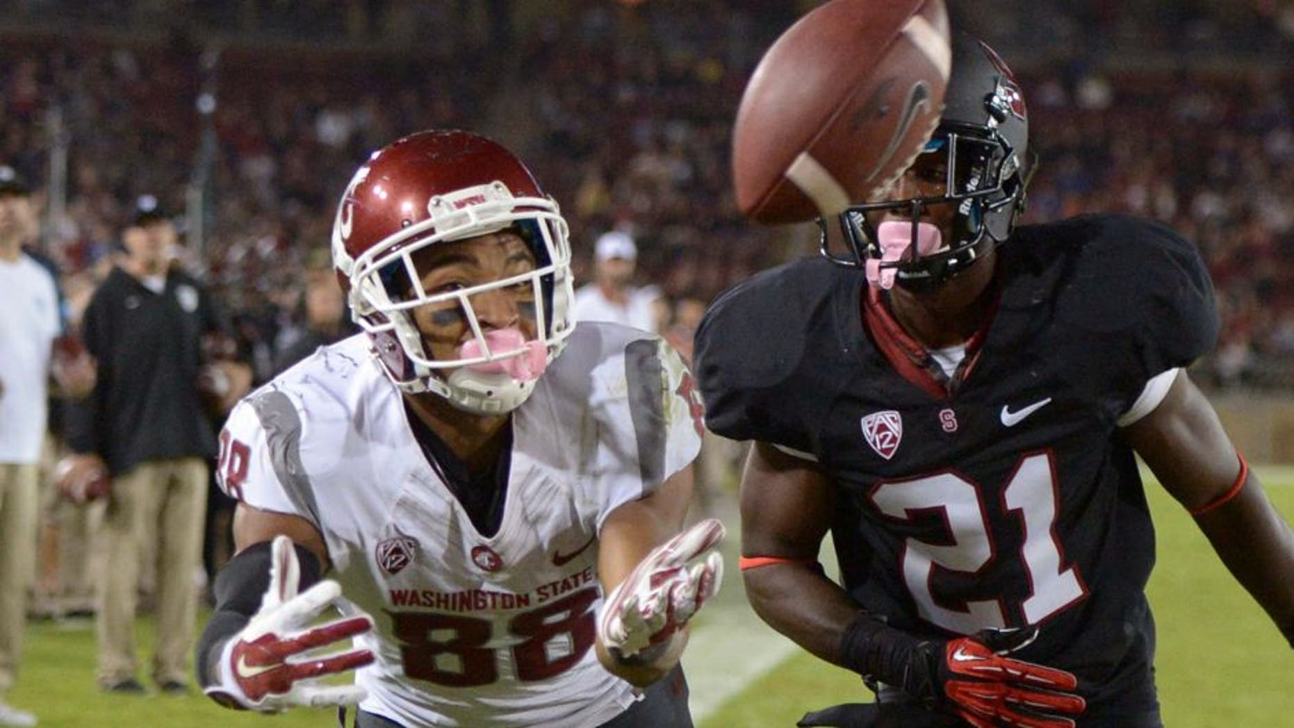 Oct 10, 2014; Stanford, CA, USA; Washington State Cougars receiver Isiah Myers (88) is defended by Stanford Cardinal cornerback Ronnie Harris (21) at Stanford Stadium. Stanford defeated Washington State 34-17. Mandatory Credit: Kirby Lee-USA TODAY Sports