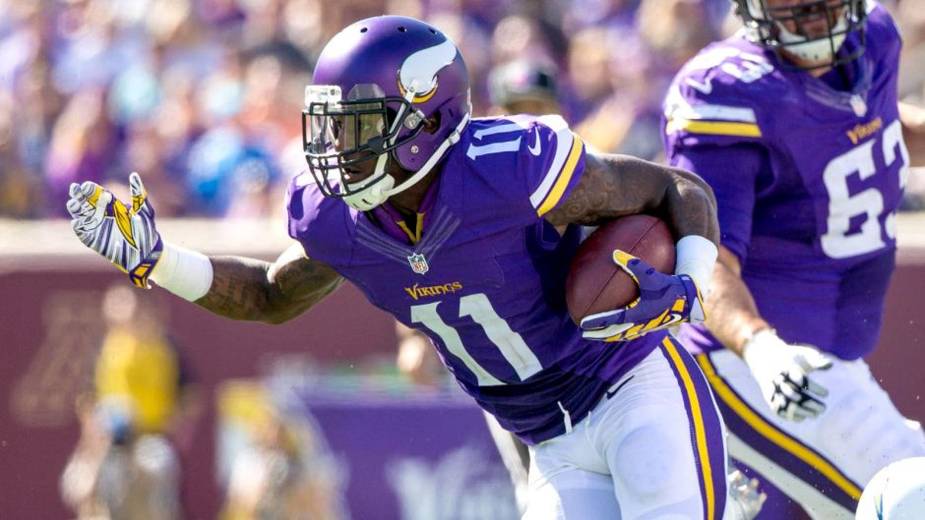 Sep 27, 2015; Minneapolis, MN, USA; Minnesota Vikings wide receiver Mike Wallace (11) carries the ball during the third quarter against the San Diego Chargers at TCF Bank Stadium. The Vikings defeated the Chargers 31-14. Mandatory Credit: Brace Hemmelgarn-USA TODAY Sports