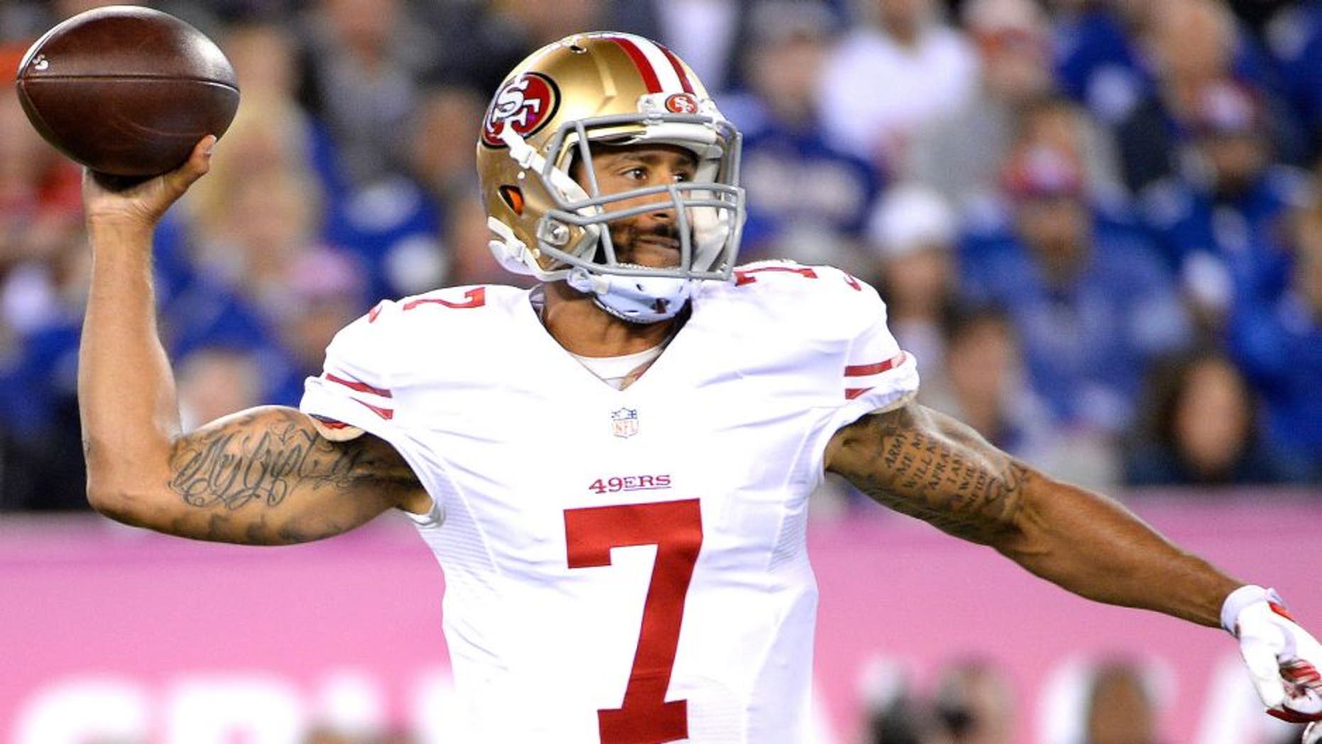 Oct 11, 2015; East Rutherford, NJ, USA; San Francisco 49ers quarterback Colin Kaepernick (7) throws the ball against the New York Giants in the second quarter at MetLife Stadium. Mandatory Credit: Robert Deutsch-USA TODAY Sports