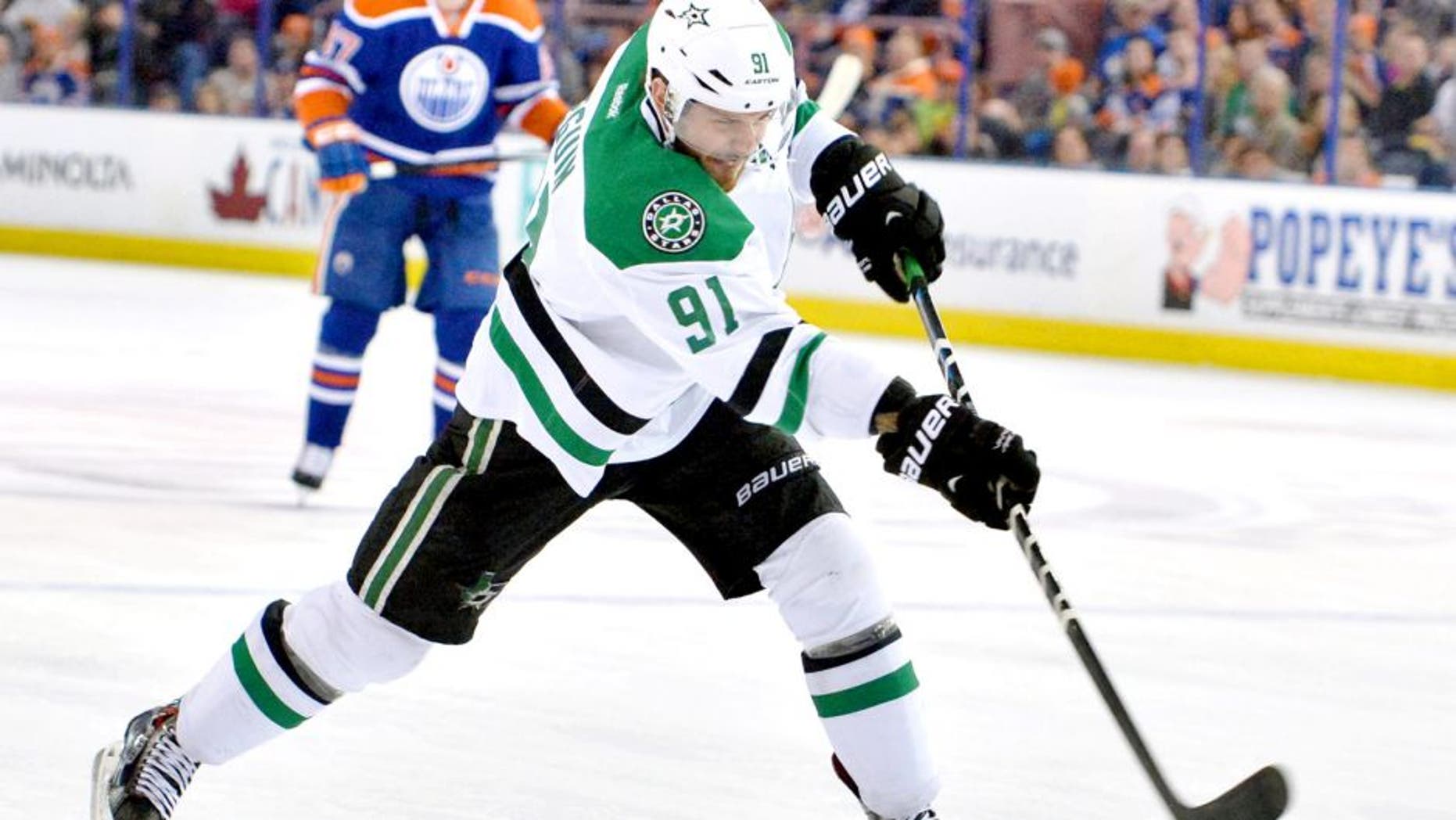 Mar 27, 2015; Edmonton, Alberta, CAN; Dallas Stars center Tyler Seguin (91) takes a slap shot against the Edmonton Oilers in the second period at Rexall Place. Mandatory Credit: Chris LaFrance-USA TODAY Sports