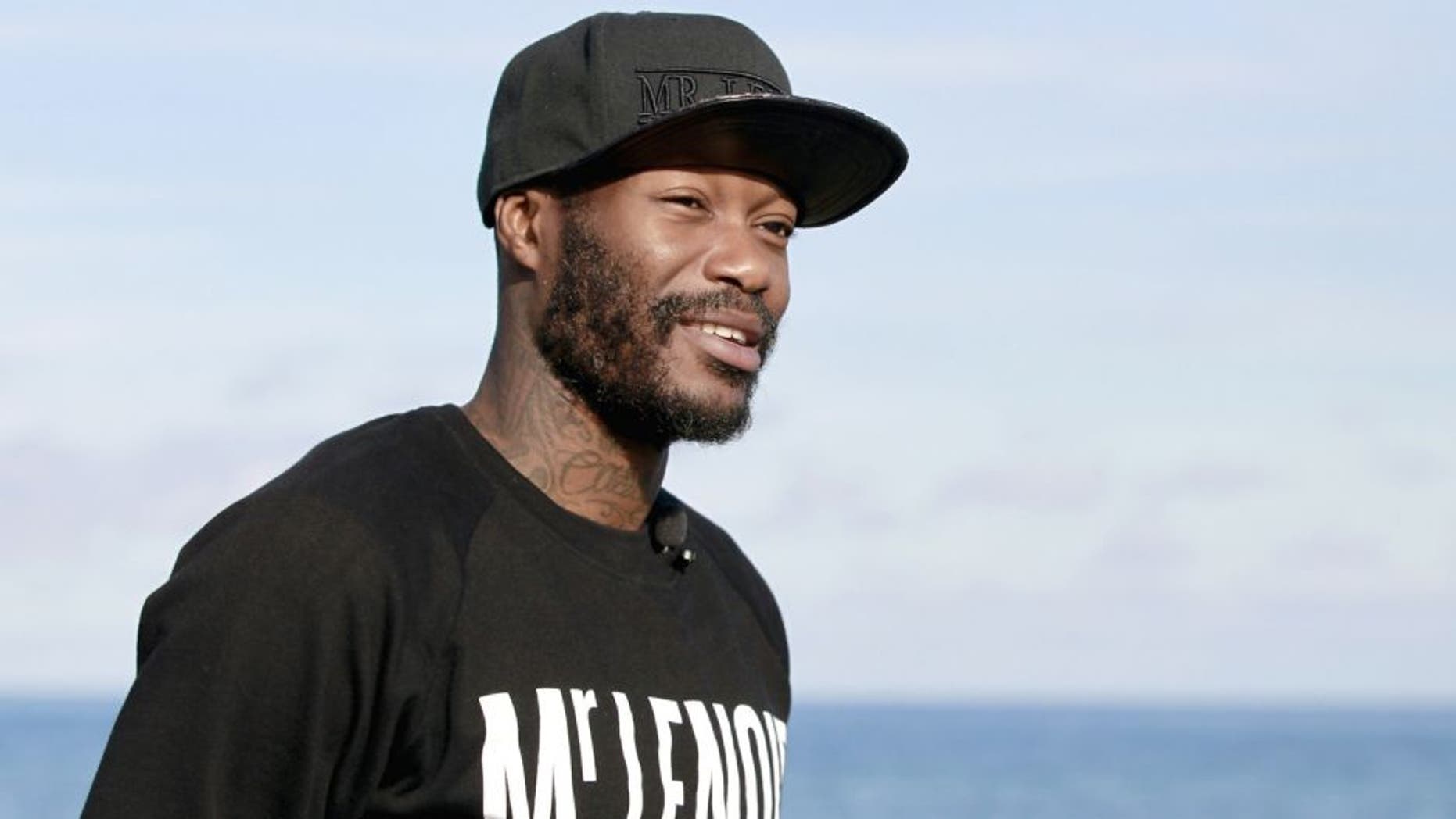 French L1 football club SC Bastia's newly recruited French forward Djibril Cisse poses on the Marana beach on January 9, 2014, outside Bastia. AFP PHOTO / PASCAL POCHARD-CASABIANCA (Photo credit should read PASCAL POCHARD CASABIANCA/AFP/Getty Images)