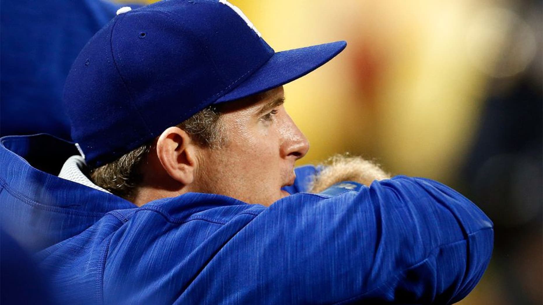 NEW YORK, NY - OCTOBER 12: Chase Utley #26 of the Los Angeles Dodgers looks on from the dugout against the New York Mets during game three of the National League Division Series at Citi Field on October 12, 2015 in New York City. (Photo by Mike Stobe/Getty Images)