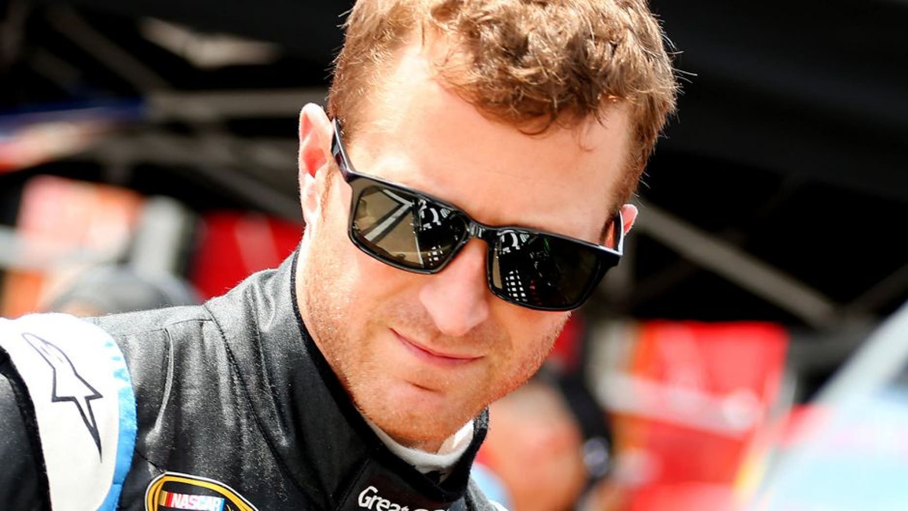 BRISTOL, TN - AUGUST 21: Kasey Kahne, driver of the #5 Great Clips Chevrolet, stands in the garage area during practice for the NASCAR Sprint Cup Series Irwin Tools Night Race at Bristol Motor Speedway on August 21, 2015 in Bristol, Tennessee. (Photo by Matt Sullivan/NASCAR via Getty Images)