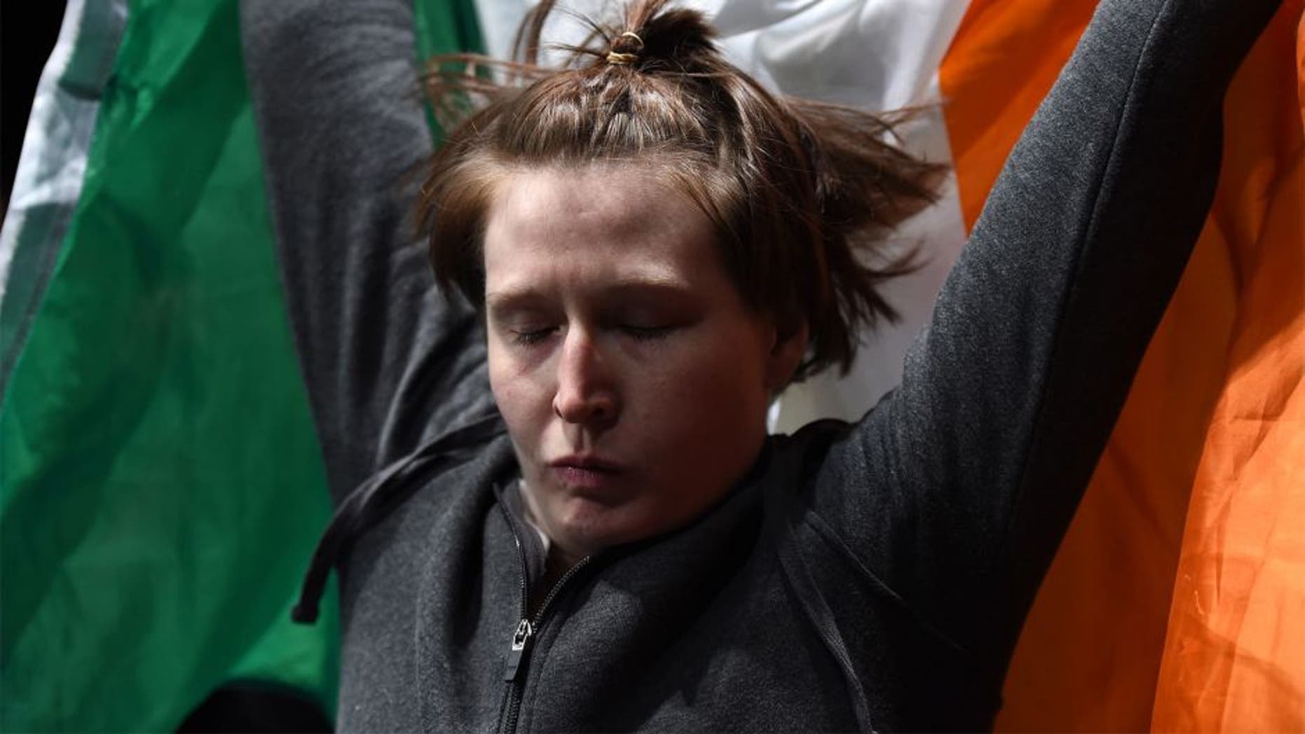 LAS VEGAS, NEVADA - DECEMBER 12: Aisling Daly prepares to enter the Octagon before facing Aisling Daly in their strawweight fight during The Ultimate Fighter Finale event inside the Pearl concert theater at the Palms Casino Resort on December 12, 2014 in Las Vegas, Nevada. (Photo by Jeff Bottari/Zuffa LLC/Zuffa LLC via Getty Images)