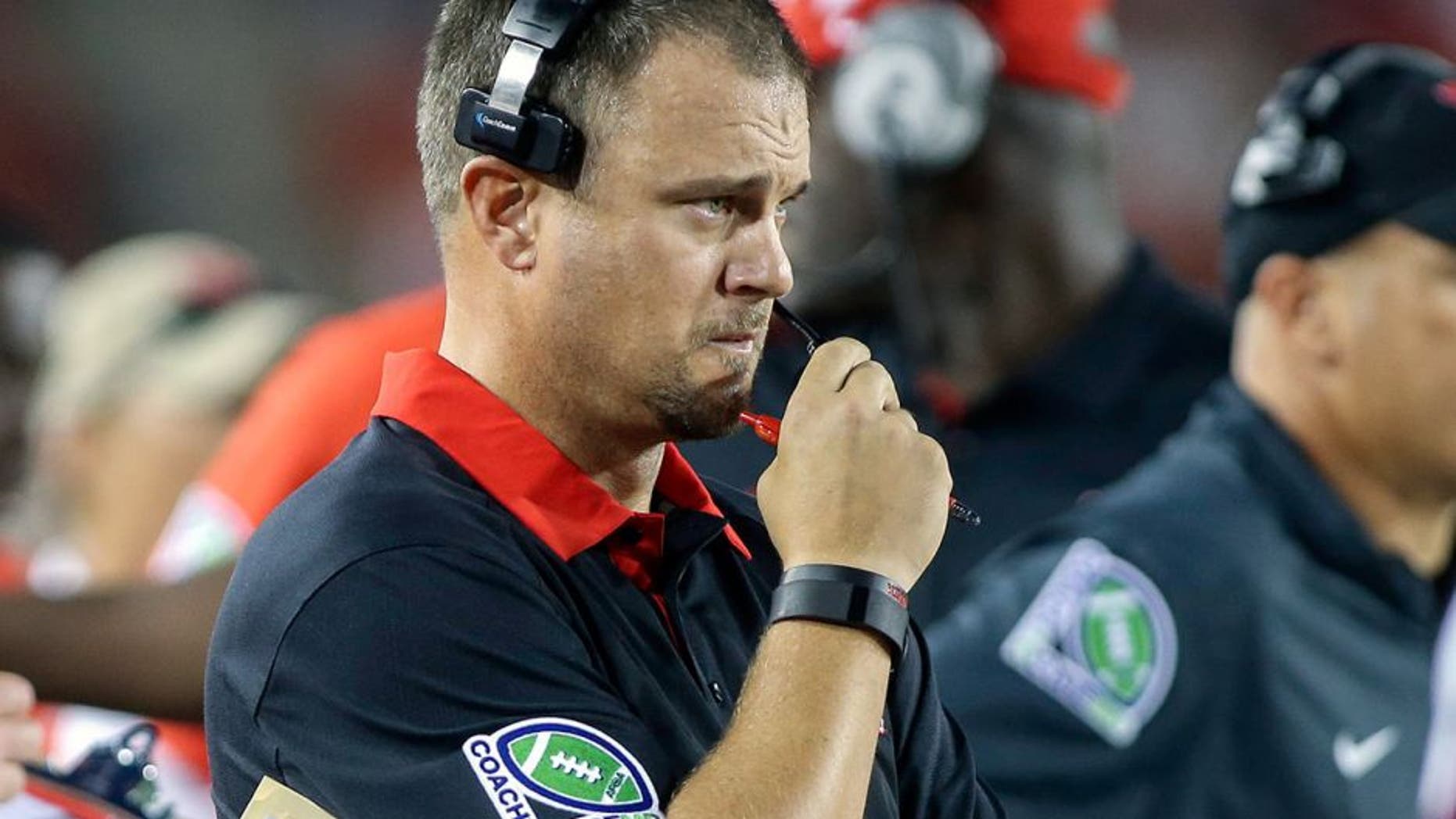 Sep 26, 2015; Houston, TX, USA; Houston Cougars head coach Tom Herman watches from the sideline during the first quarter against the Texas State Bobcats at TDECU Stadium. Mandatory Credit: Troy Taormina-USA TODAY Sports