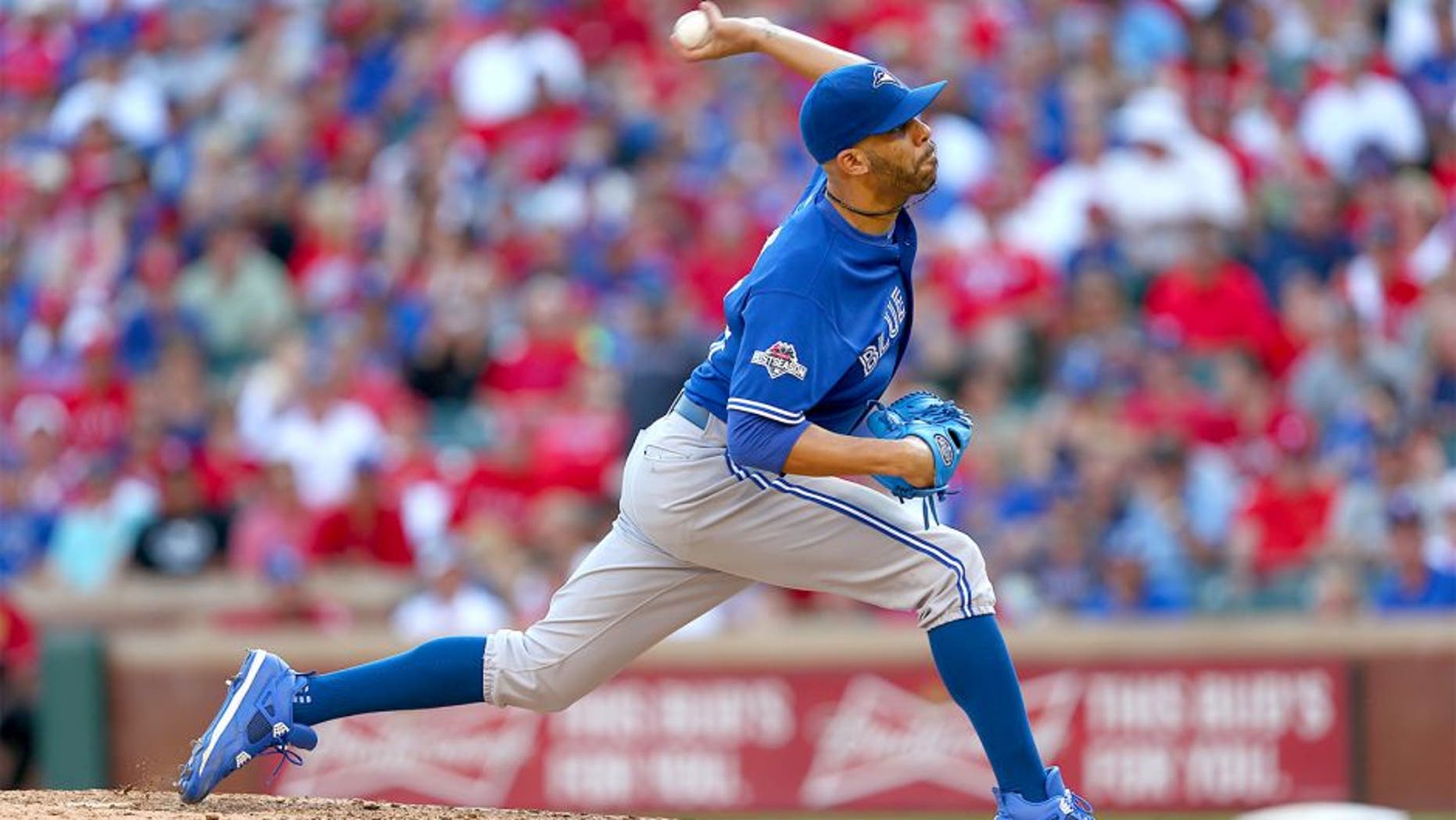 ARLINGTON, TEXAS - OCTOBER 12: David Price #14 of the Toronto Blue Jays pitches during Game 4 of the ALDS against the Texas Rangers at Globe Life Park on Monday, October 12, 2015 in Arlington, Texas. (Photo by Sarah Crabill/MLB Photos via Getty Images)