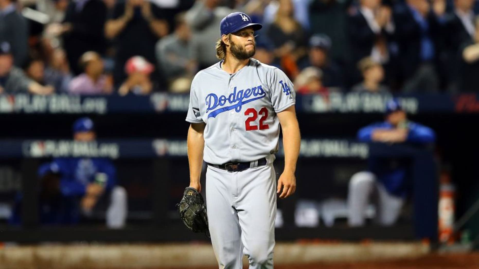 NEW YORK, NY - OCTOBER 13: Clayton Kershaw #22 of the Los Angeles Dodgers reacts against the New York Mets during game four of the National League Division Series at Citi Field on October 13, 2015 in New York City. (Photo by Elsa/Getty Images)