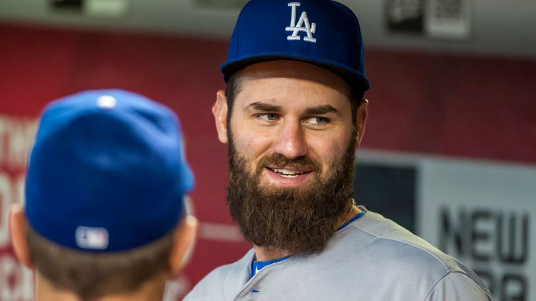 PHOENIX, AZ - SEPTEMBER 13: Scott Van Slyke #33 of the Los Angeles Dodgers talks with coach Tim Wallach #29 before a MLB game against the Arizona Diamondbacks on September 13, 2015 at Chase Field in Phoenix, Arizona. (Photo by Darin Wallentine/Getty Images)