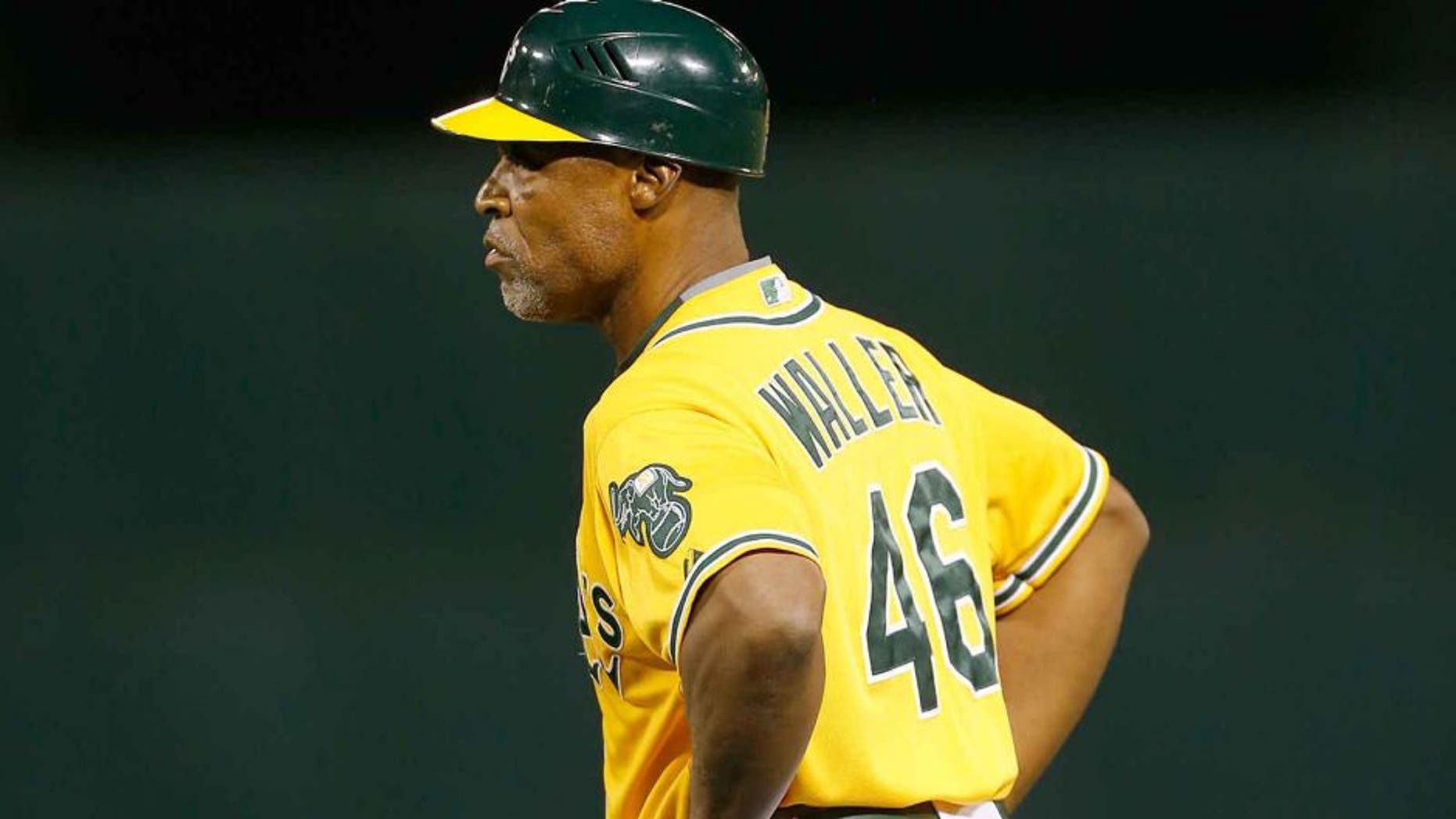 OAKLAND, CA - SEPTEMBER 9: First Base Coach Tye Waller #46 of the Oakland Athletics stands at first during the game against the Houston Astros at O.co Coliseum on September 9, 2015 in Oakland, California. The Astros defeated the Athletics 11-5. (Photo by Michael Zagaris/Oakland Athletics/Getty Images)