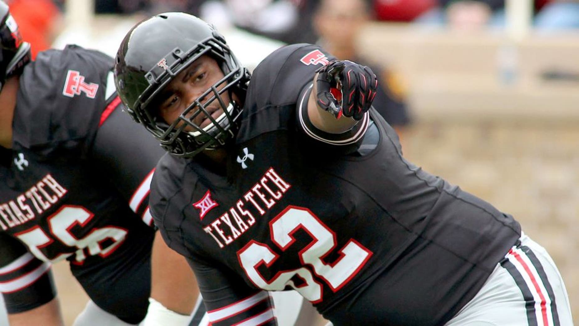 Sep 13, 2014; Lubbock, TX, USA; Texas Tech Red Raiders offensive tackle Le'Raven Clark (62) during the game with the Arkansas Razorbacks at Jones AT&T Stadium. Mandatory Credit: Michael C. Johnson-USA TODAY Sports