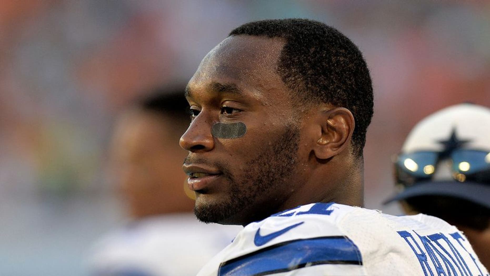 Aug 23, 2014; Miami Gardens, FL, USA; Dallas Cowboys running back Joseph Randle (21) looks on during the first half against the Miami Dolphins at Sun Life Stadium. Mandatory Credit: Steve Mitchell-USA TODAY Sports