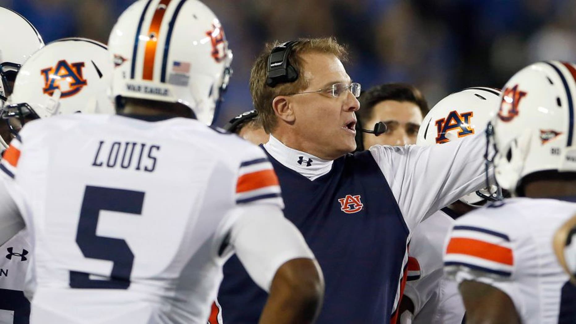 Oct 15, 2015; Lexington, KY, USA; Auburn Tigers head coach Gus Malzahn coaches his team against the Kentucky Wildcats in the first quarter at Commonwealth Stadium. Mandatory Credit: Mark Zerof-USA TODAY Sports