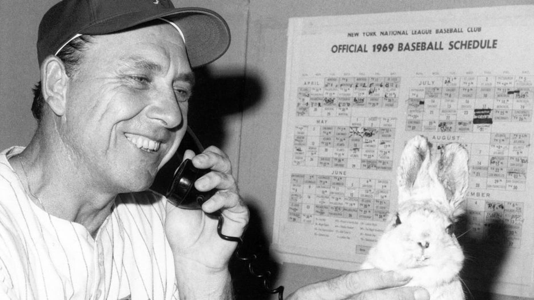 FLUSHING, NY - SEPTEMBER 8: Manager Gil Hodges of the New York Mets rubs a stuffed rabbit following the game against the Chicago Cubs on September 8, 1969 at Shea Stadium in Flushing, New York. (Photo by B Bennett/Getty Images)
