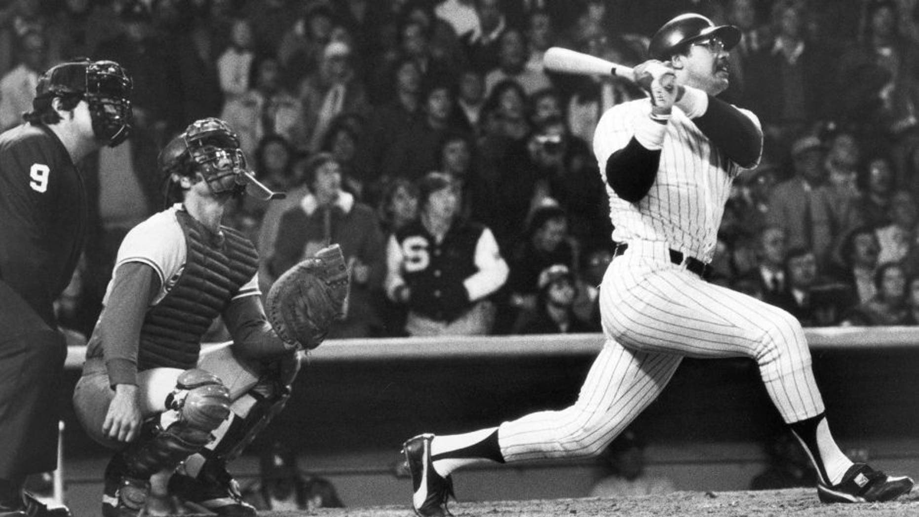 BRONX, NY - OCTOBER 18: Reggie Jackson of the New York Yankees hits his third consecutive home run of the game against the Los Angeles Dodgers in the eight inning of Game six of the 1977 World Series at Yankee Stadium on October 18, 1977 in the Bronx, New York. The Yankees defeated the Dodgers 8-4 and won the World Series four games to two. (Photo by Louis Requena/MLB Photos via Getty Images)