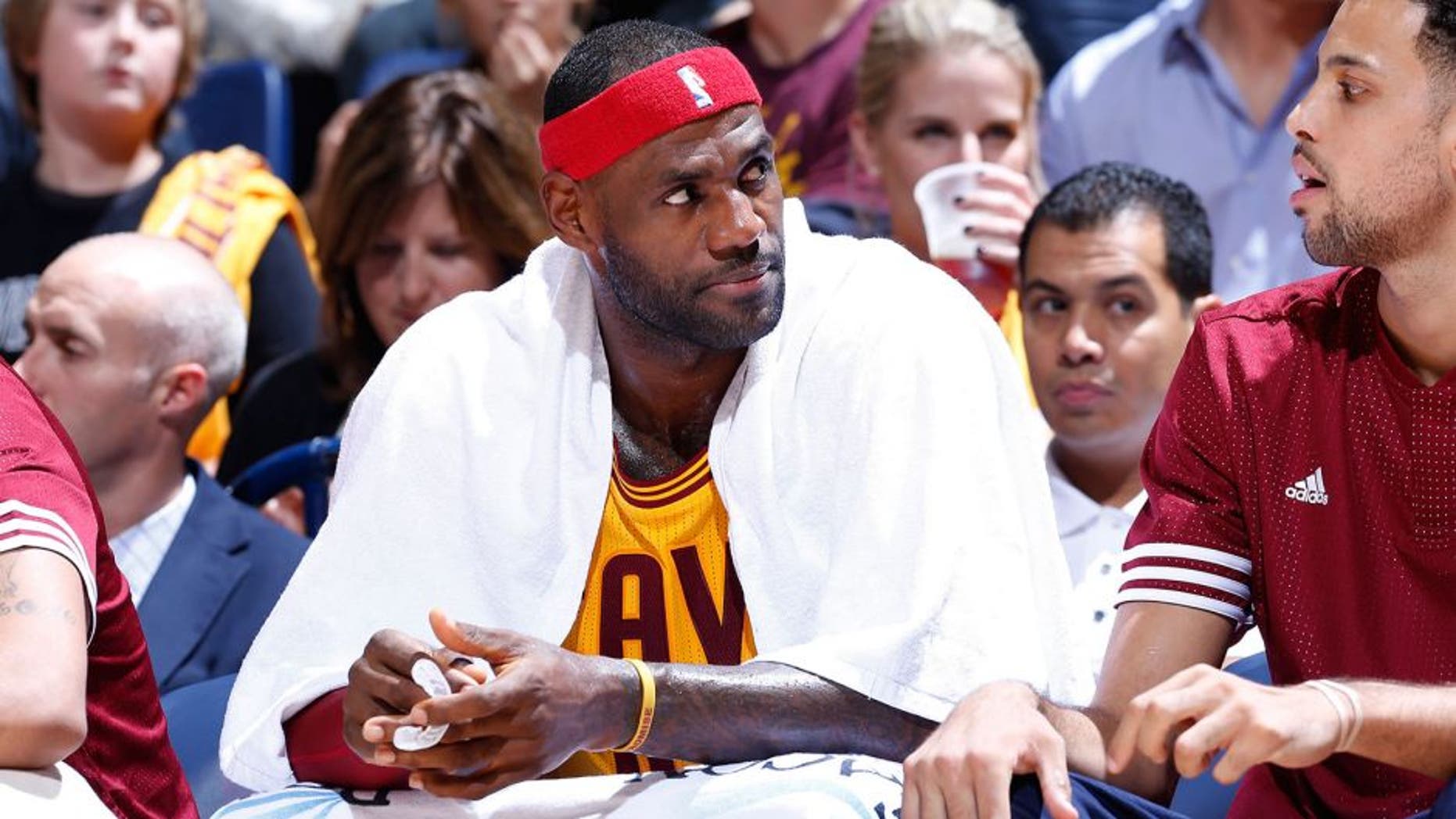 CINCINNATI, OH - OCTOBER 7: LeBron James #23 of the Cleveland Cavaliers looks on against the Atlanta Hawks during a preseason game at Cintas Center on October 7, 2015 in Cincinnati, Ohio. The Hawks defeated the Cavaliers 98-96. NOTE TO USER: User expressly acknowledges and agrees that, by downloading and or using the photograph, User is consenting to the terms and conditions of the Getty Images License Agreement. (Photo by Joe Robbins/Getty Images)