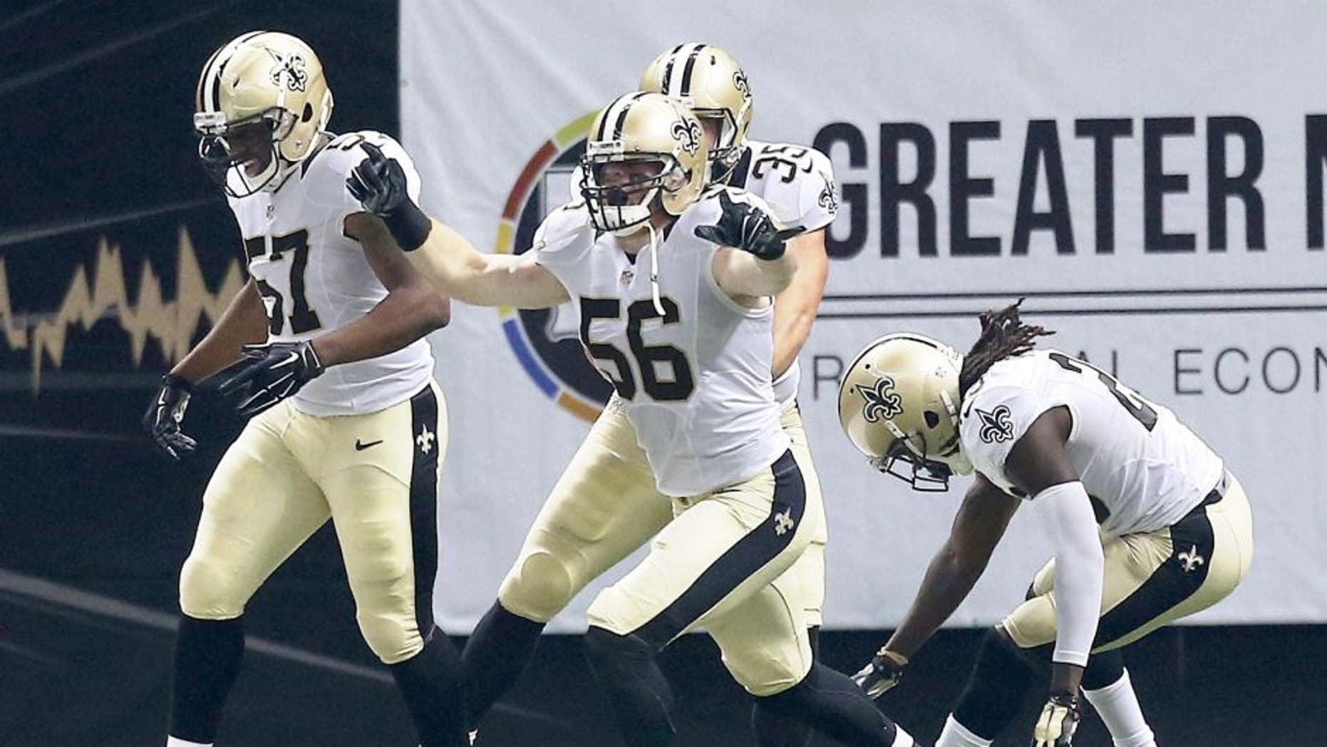 NEW ORLEANS, LA - OCTOBER 15: Michael Mauti #56 of the New Orleans Saints reacts to a touchdown folllowing a blocked punt during the first quarter of a game against the Atlanta Falcons at the Mercedes-Benz Superdome on October 15, 2015 in New Orleans, Louisiana. (Photo by Sean Gardner/Getty Images)