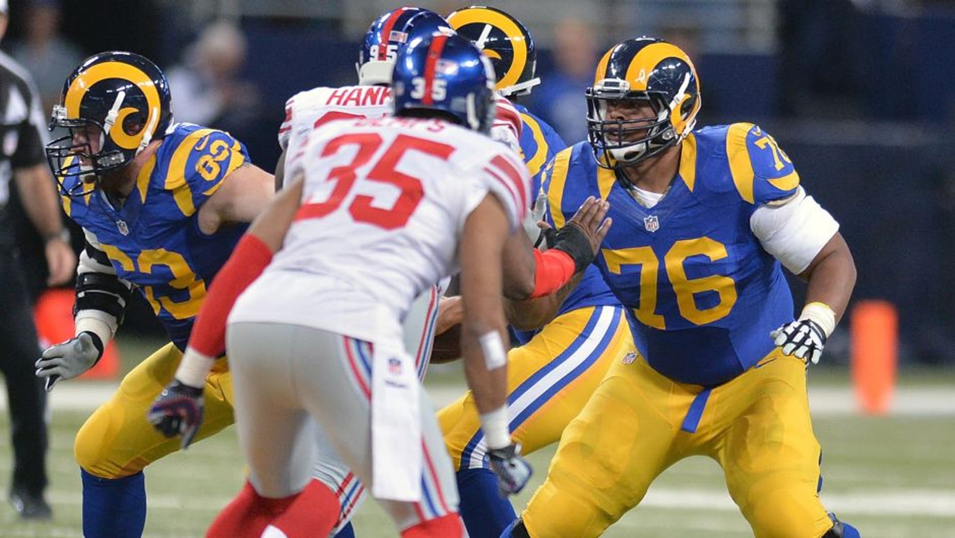 ST. LOUIS, MO - DECEMBER 21: Rodger Saffold #76 of the St. Louis Rams protects against the New York Giants at the Edward Jones Dome on December 21, 2014 in St. Louis, Missouri. (Photo by Michael Thomas/Getty Images)